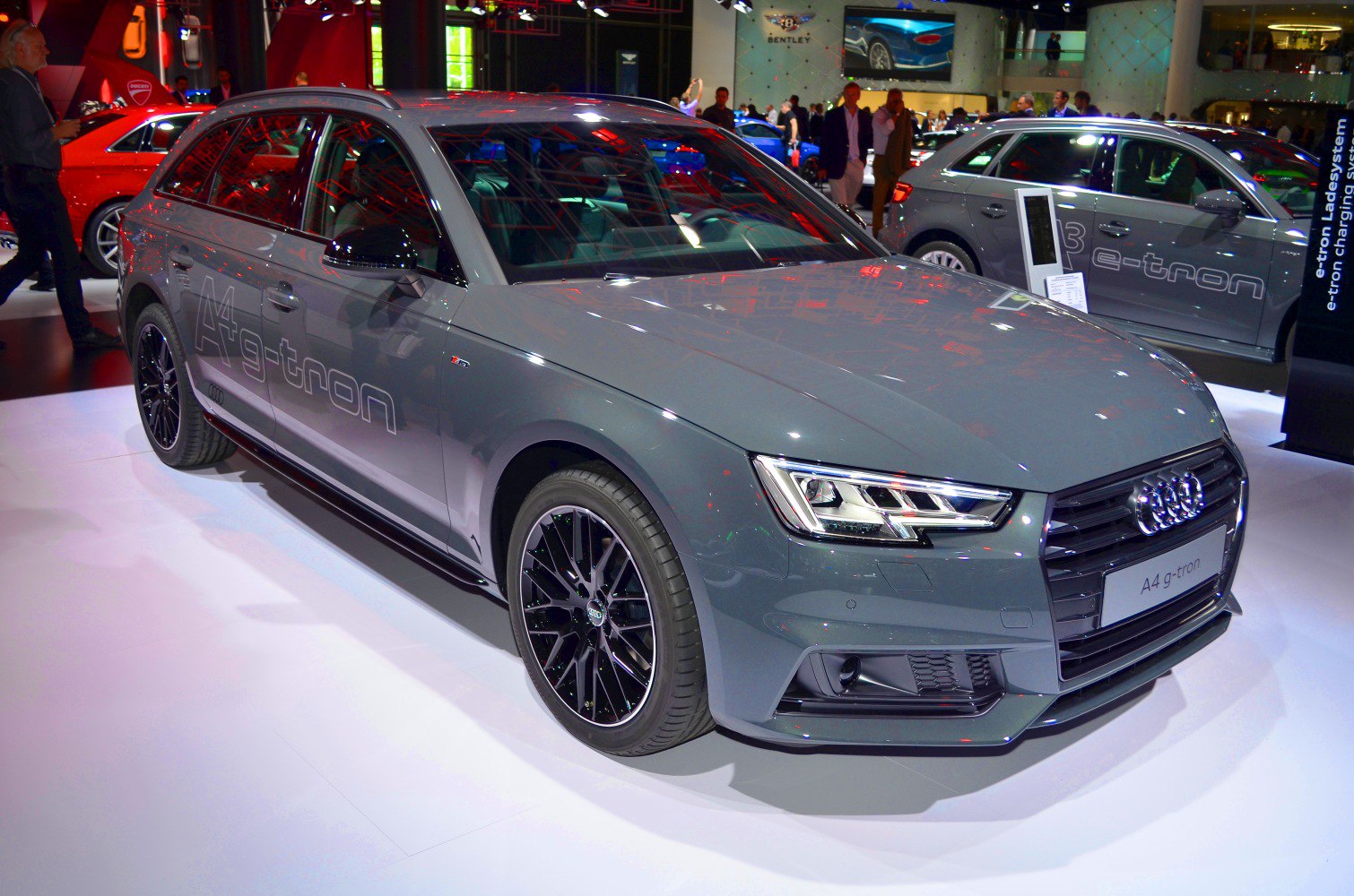 Gray A4 g-tron Avant station wagon with black rims and LED headlights