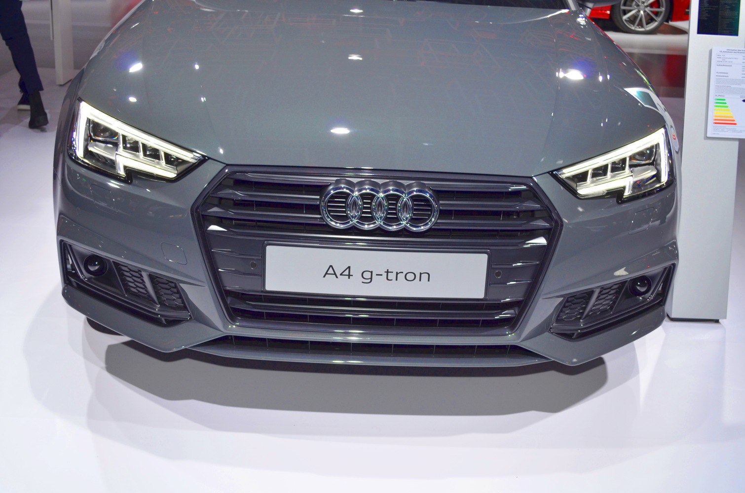 Front grille and LED headlights of a modern luxury vehicle