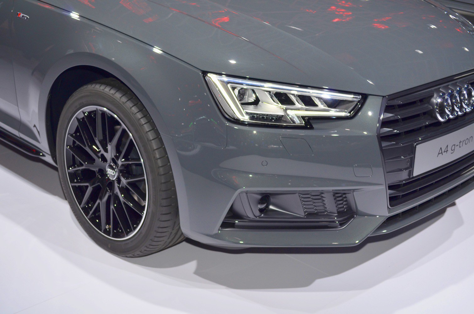 LED headlight and black alloy wheel close-up