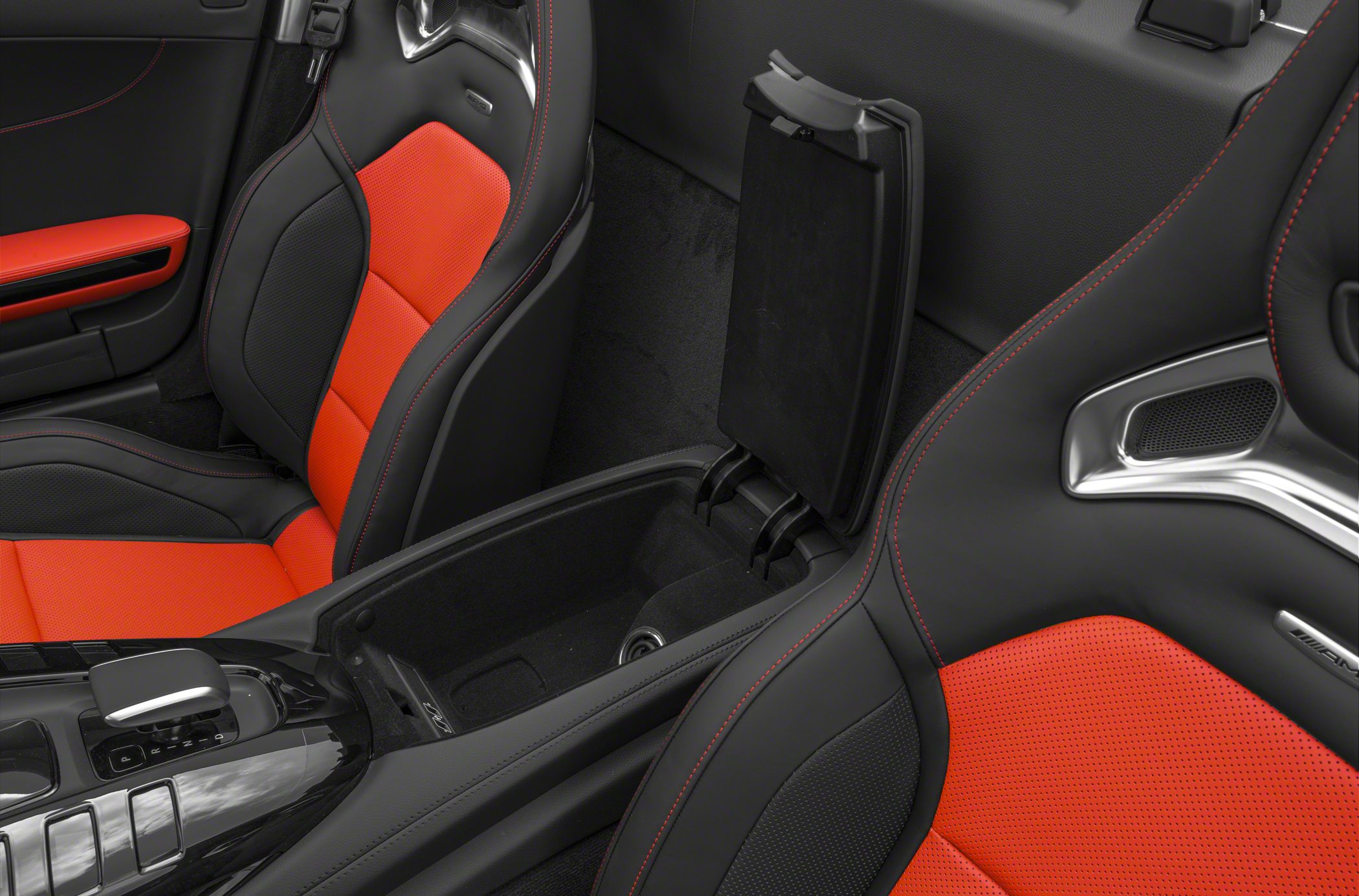 Sporty red and black perforated seats with center console storage