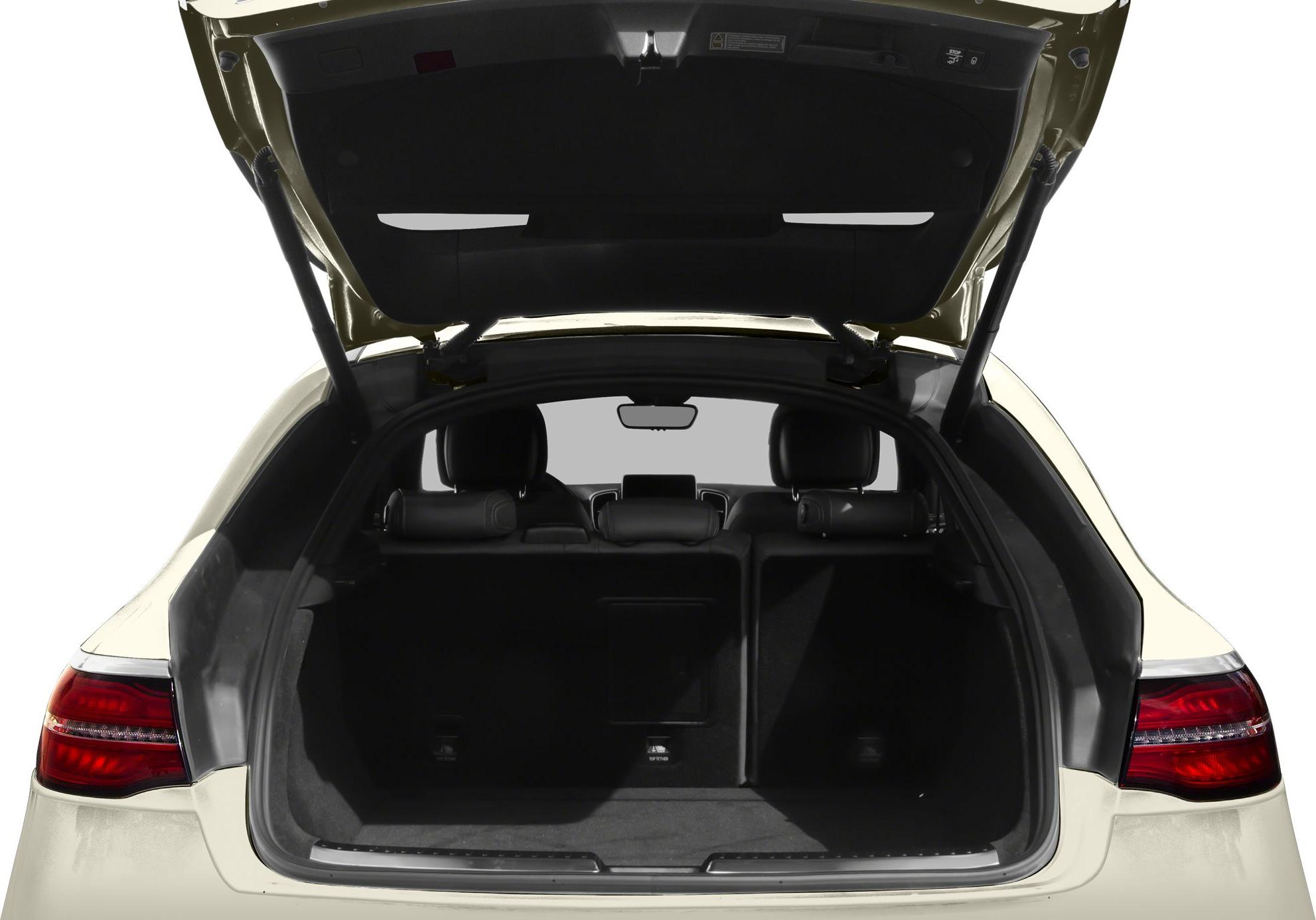 Open rear cargo space with visible rear seats and headrests