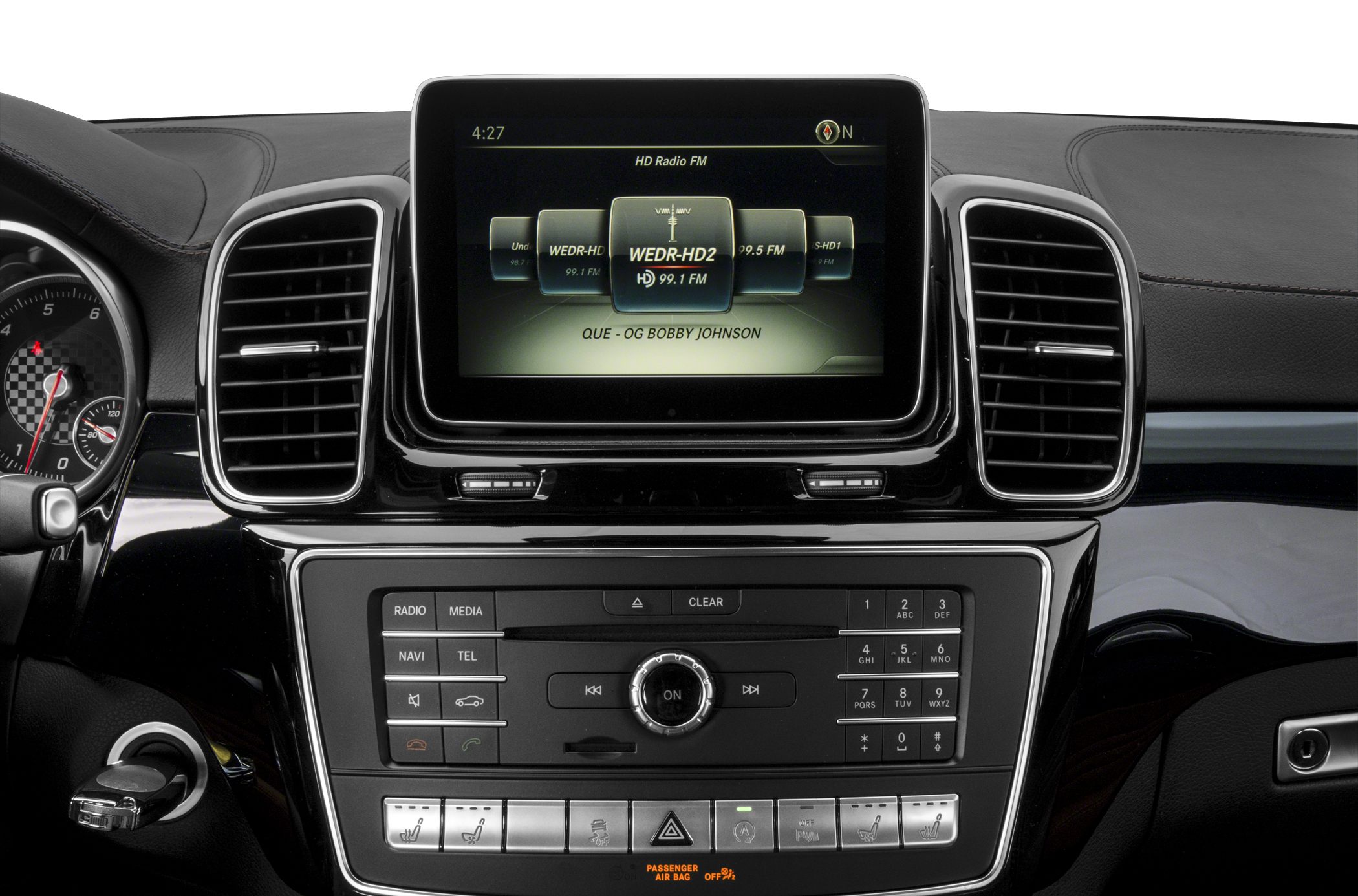 Car interior infotainment display and control panel with dual air vents.