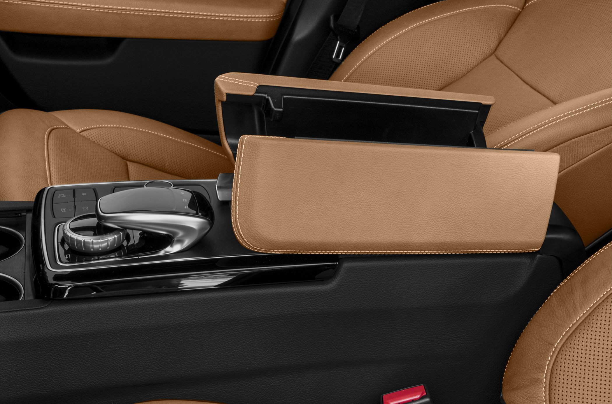 Leather armrest and control dial on luxury center console