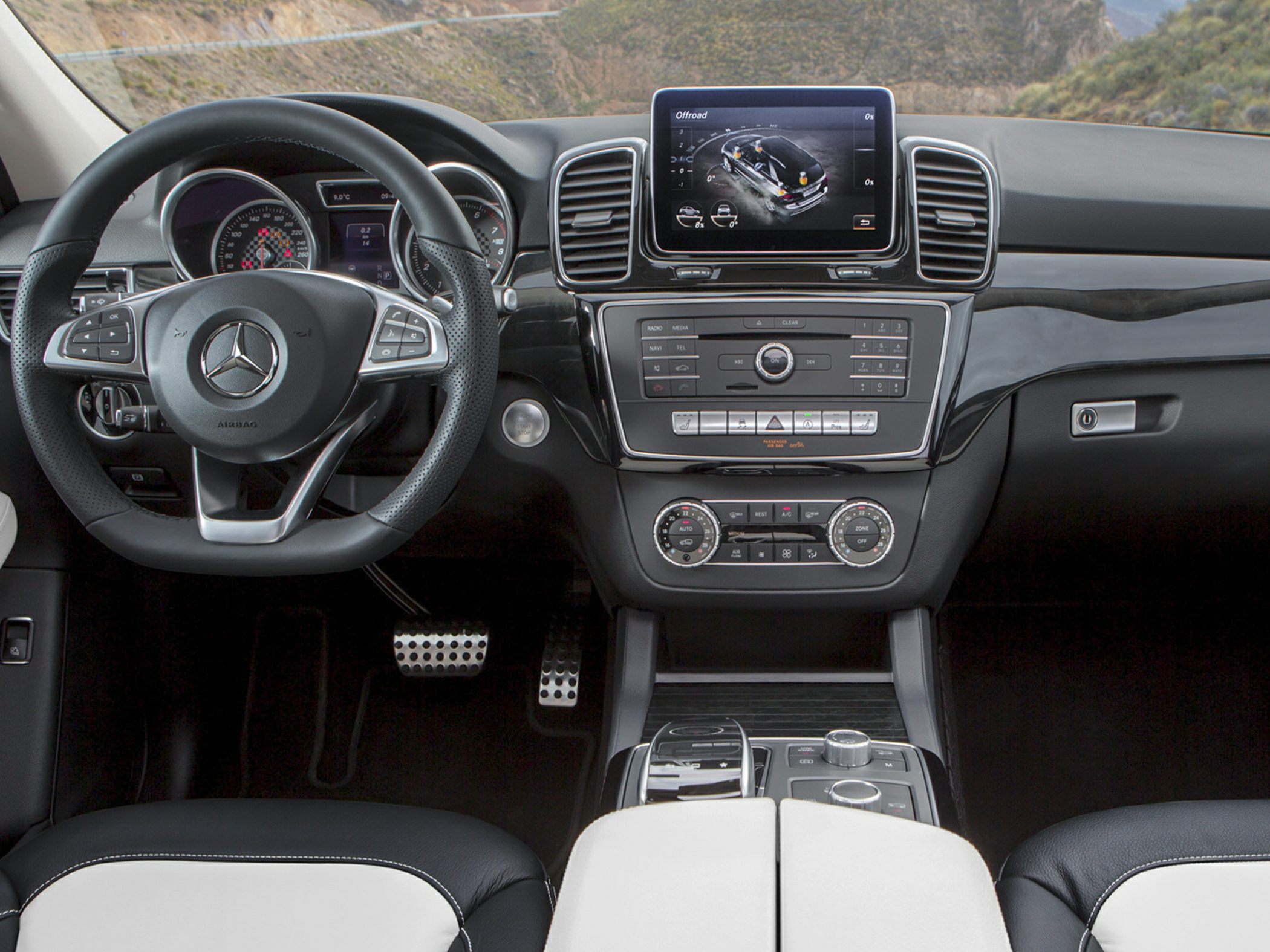 Modern dashboard and multifunction steering wheel with infotainment screen