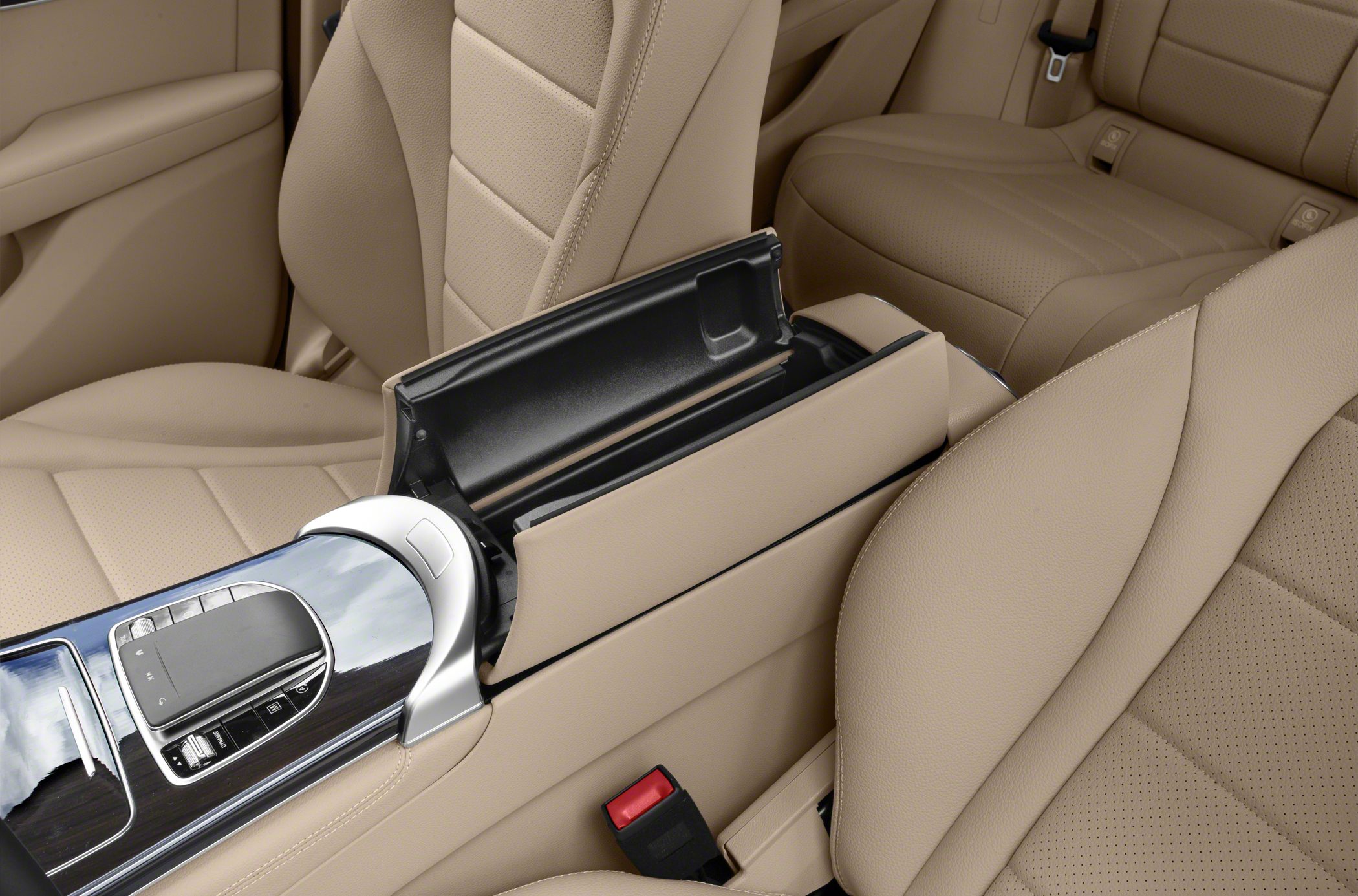Beige leather seats with a center console storage compartment