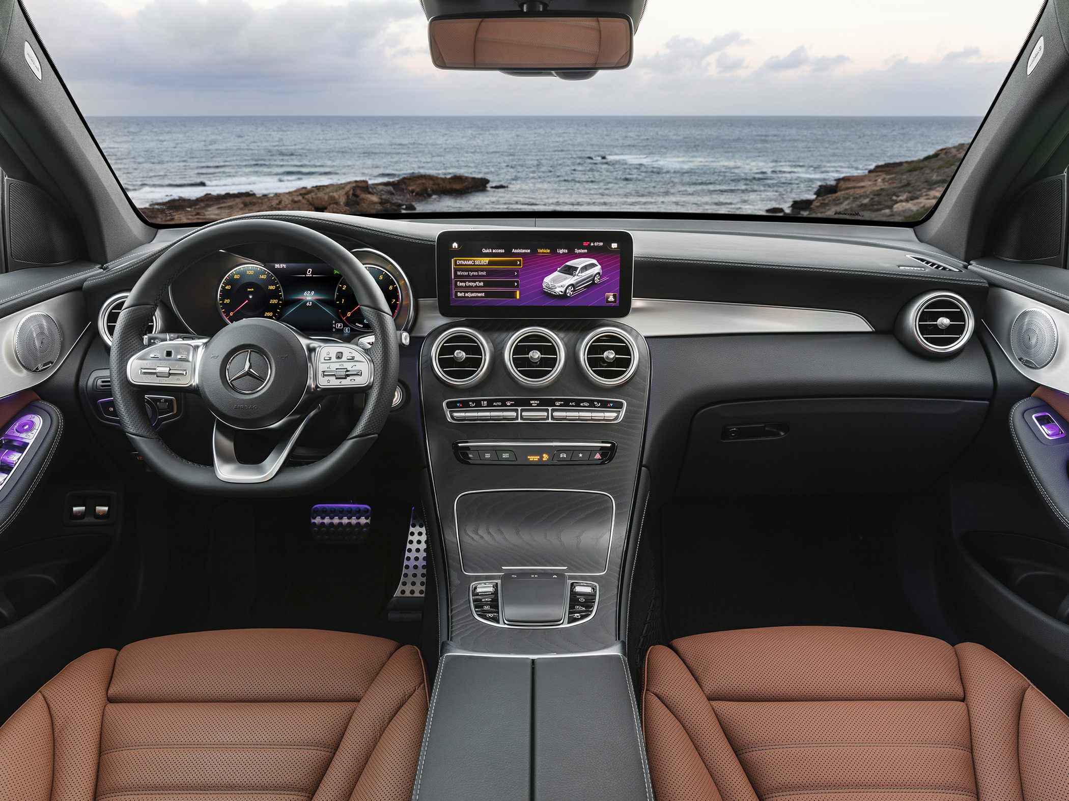 Luxury SUV interior with touchscreen and digital instrument cluster