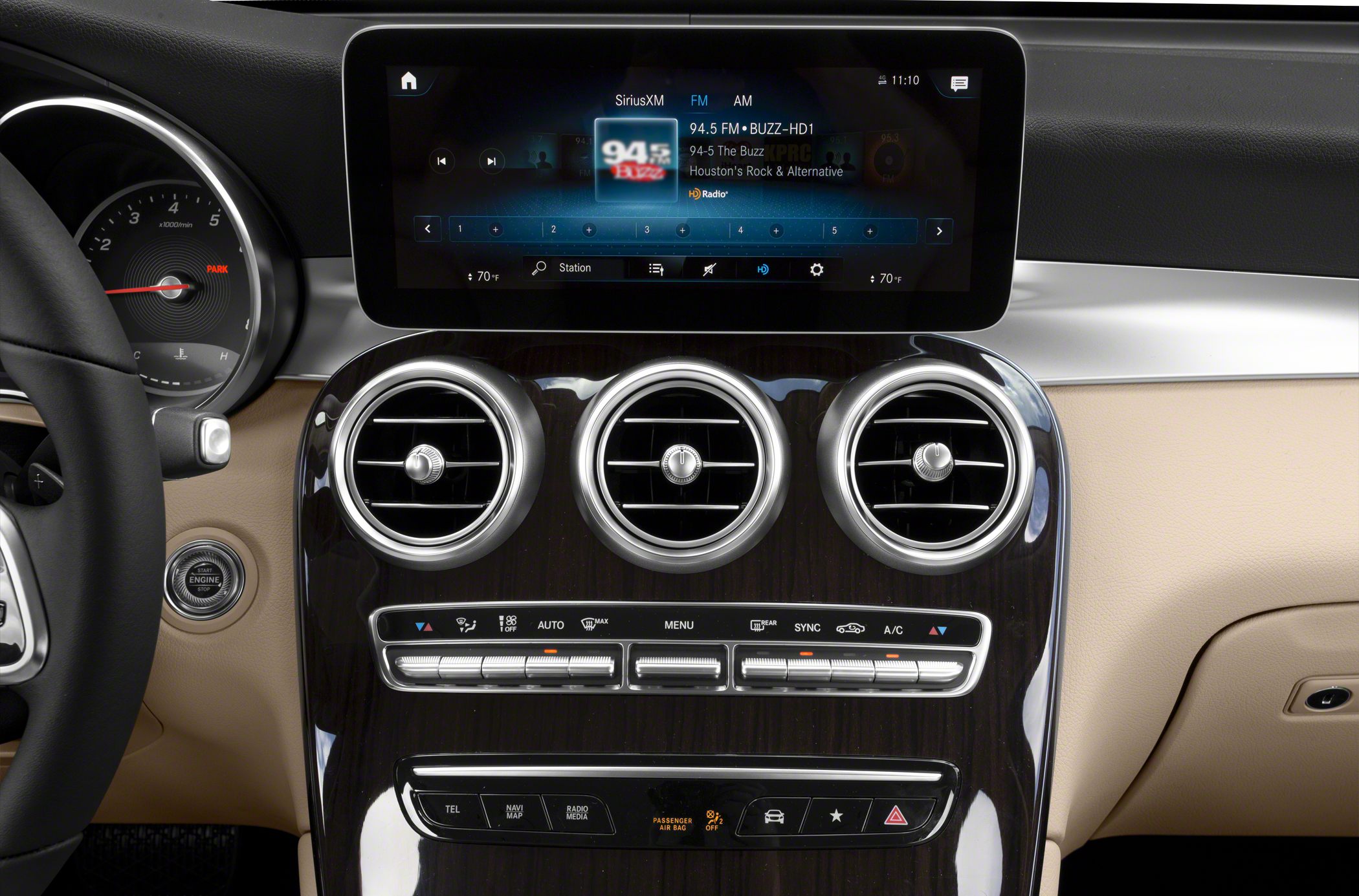 Mercedes luxury SUV dashboard, touchscreen infotainment, climate control vents and buttons