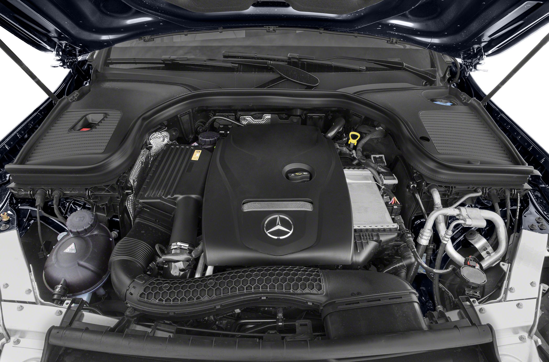 Mercedes-Benz engine bay with prominent engine cover and intake components