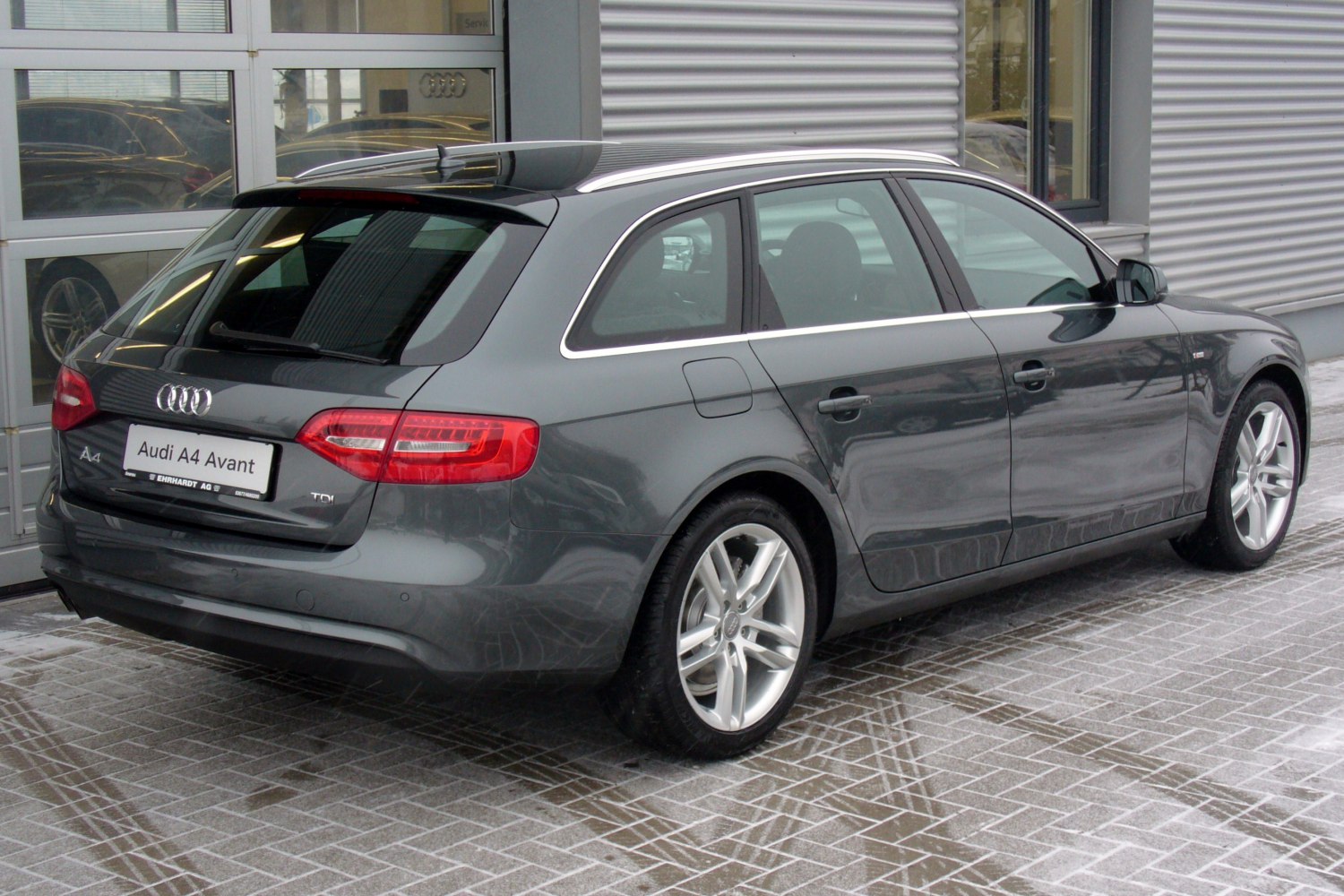 Rear and side view of a modern station wagon with alloy wheels and sleek taillights