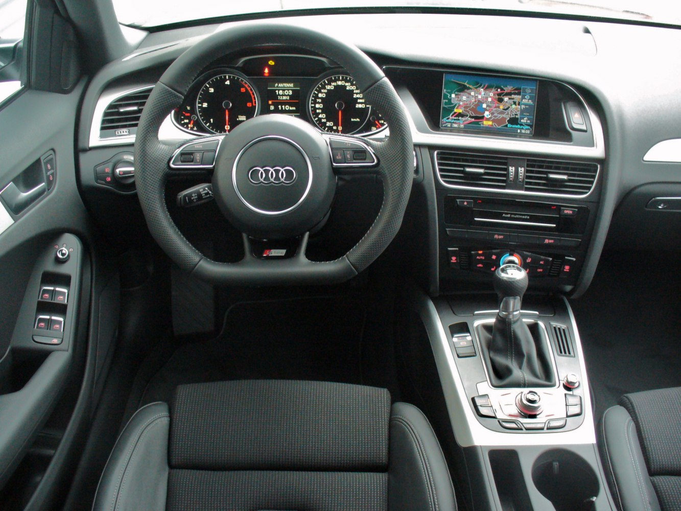 S-Line steering wheel, digital gauges, multimedia navigation system, manual gear shift