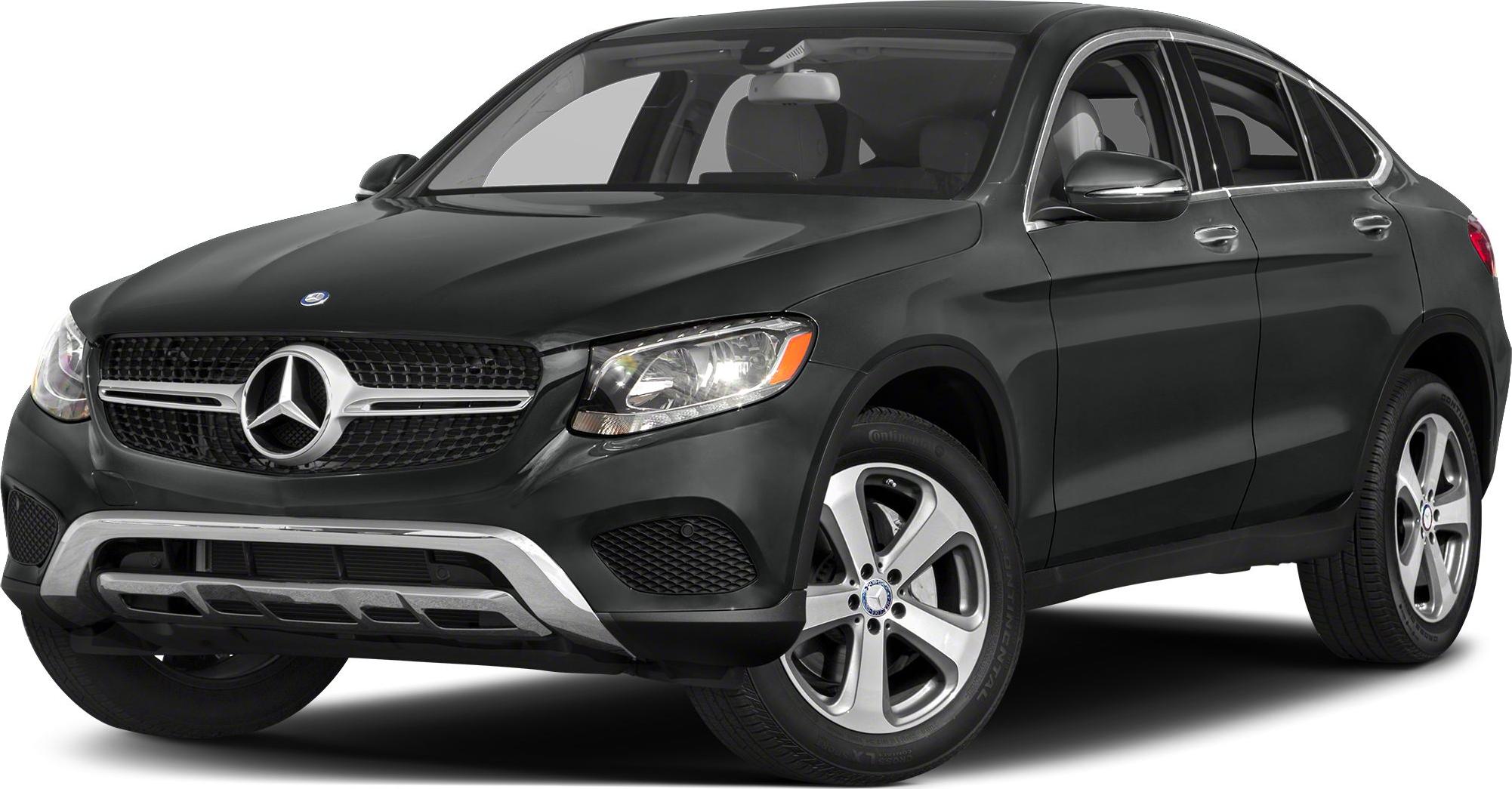 Front-side view of SUV coupe with alloy wheels and detailed grille