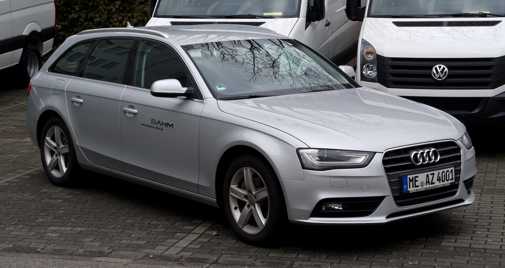 Silver station wagon with modern front grille and alloy wheels