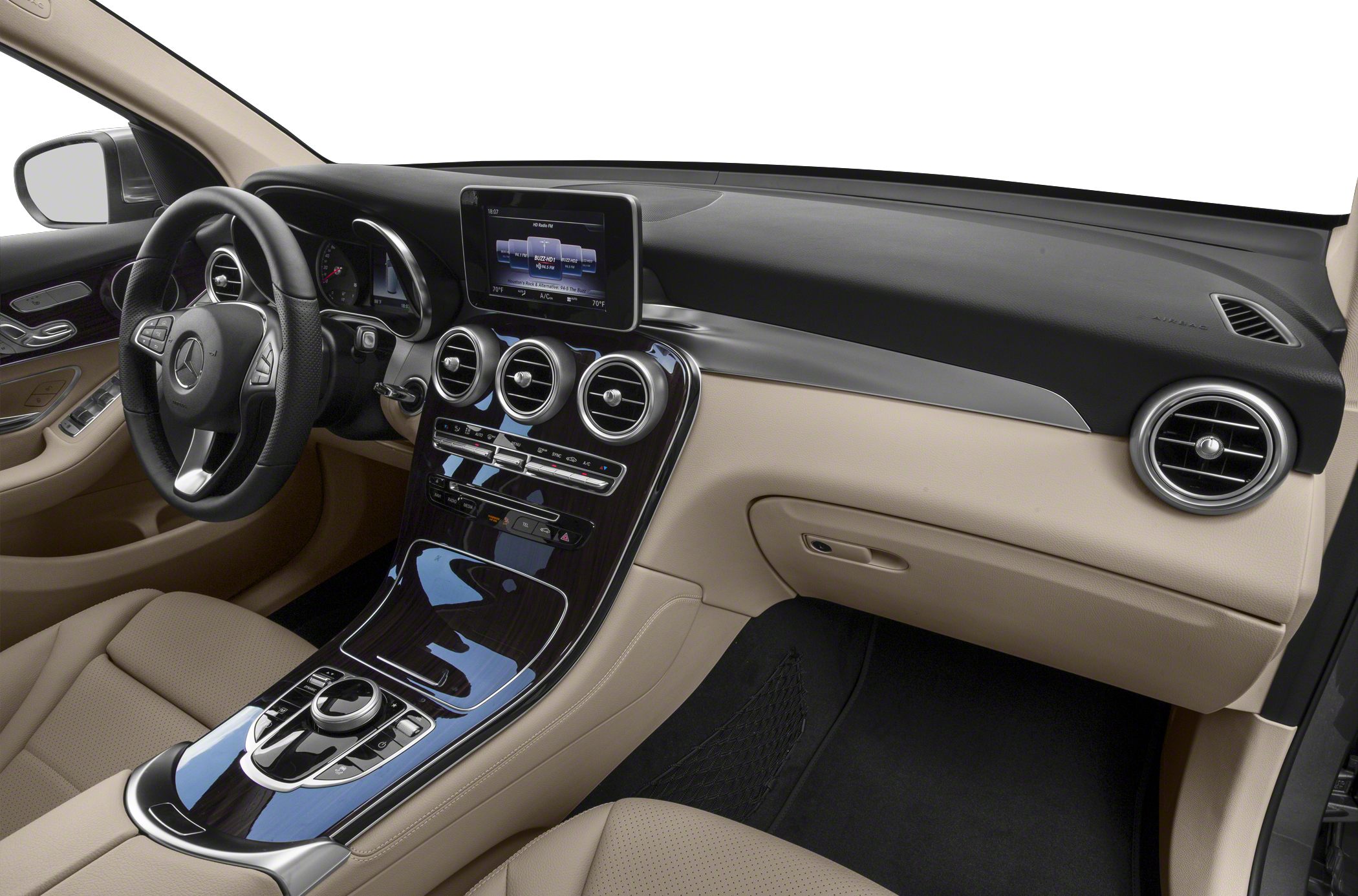 Beige luxury car interior with dashboard and center console controls