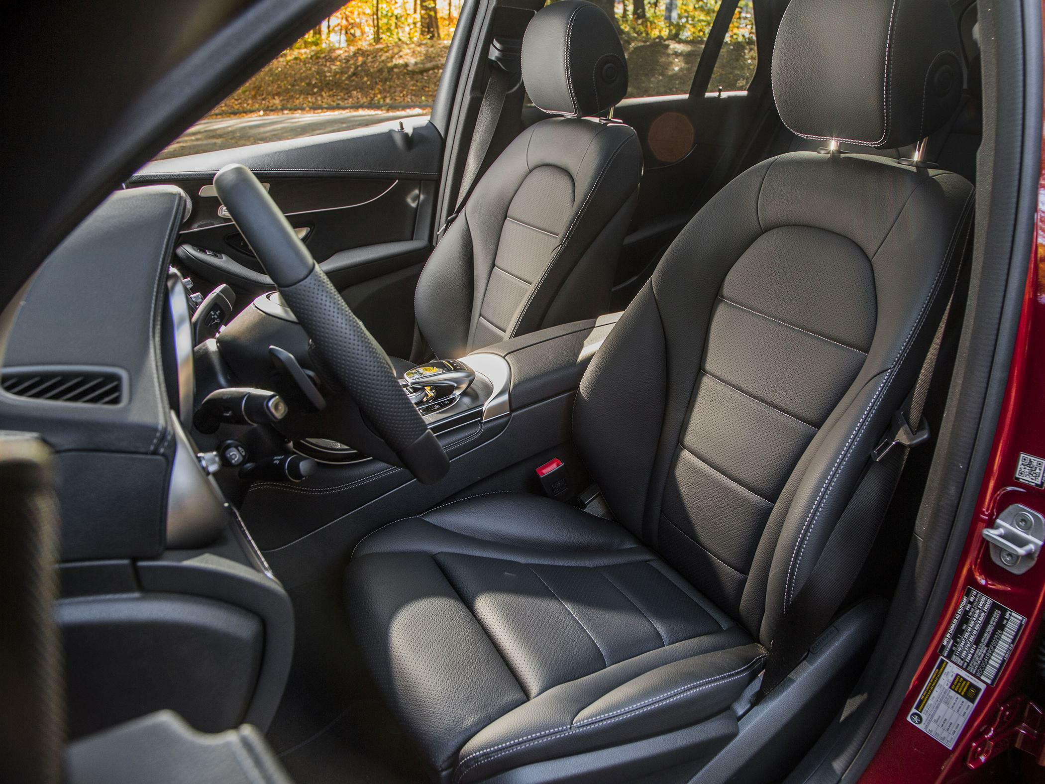 Premium black leather seats and dashboard interior with modern design details.