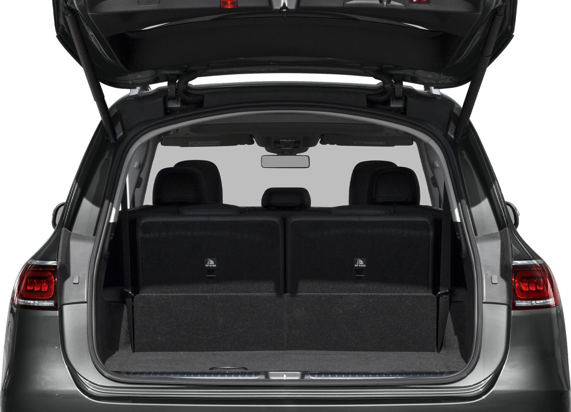 Rear cargo area with open tailgate and rear passenger seats