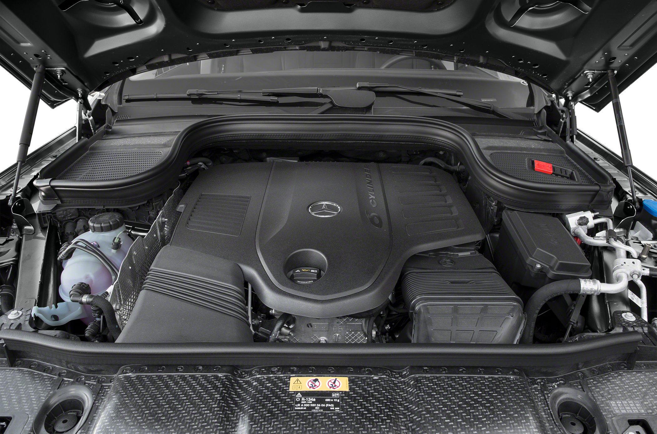 Engine compartment with prominent Mercedes-Benz engine cover and components