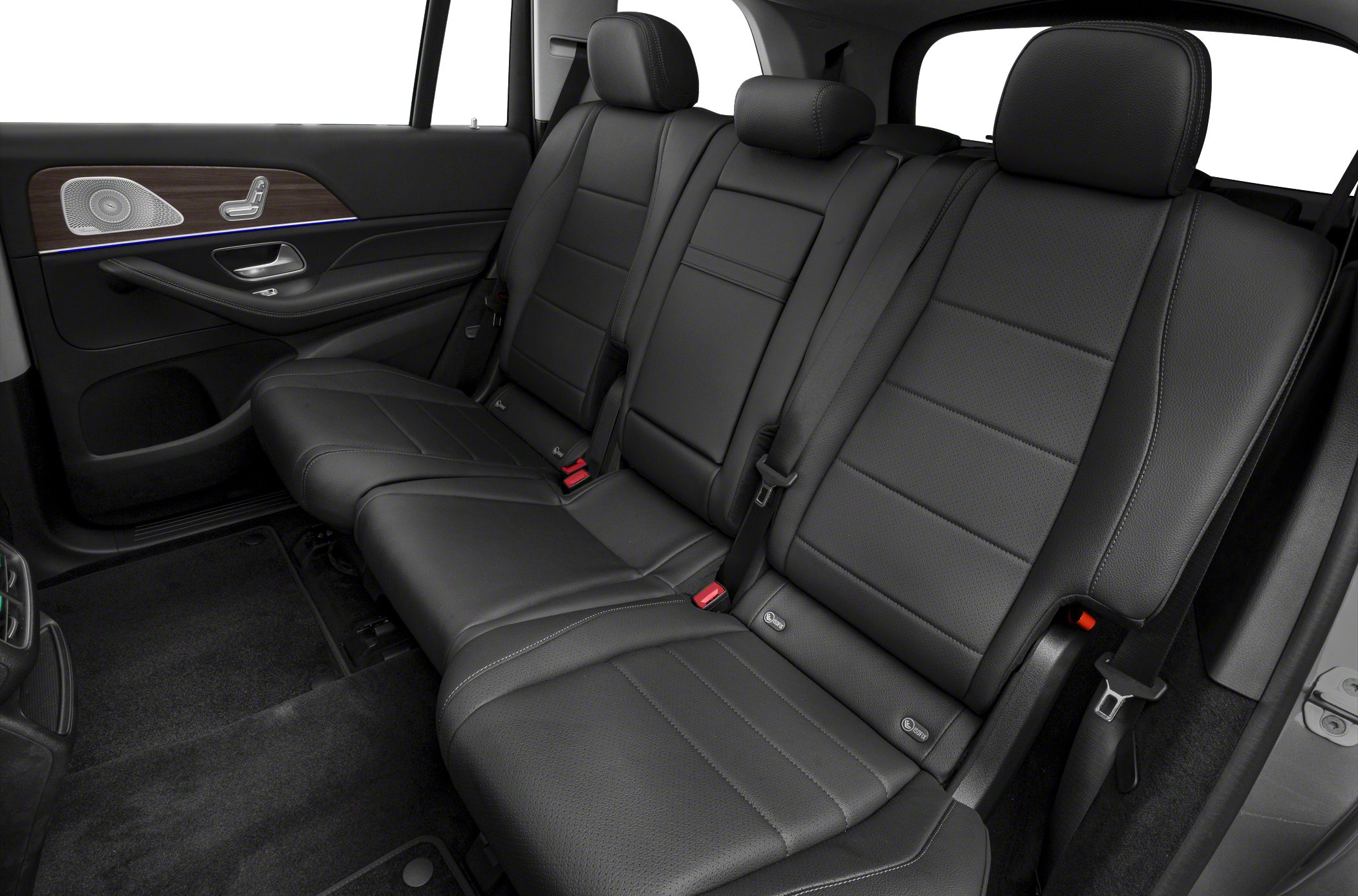 Black leather rear passenger seats with headrests and door panel detailing