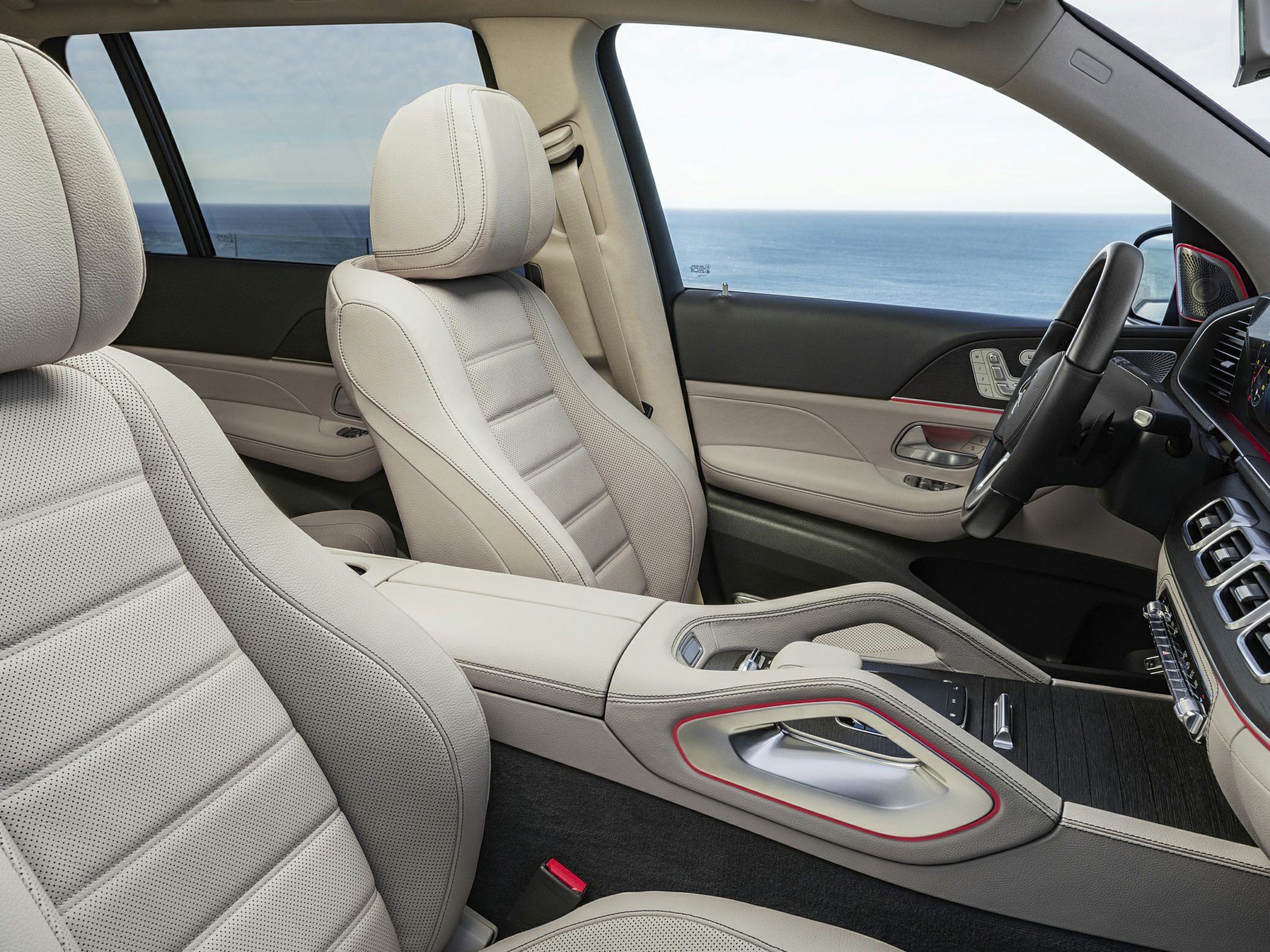 Beige leather luxury seats and modern central console interior