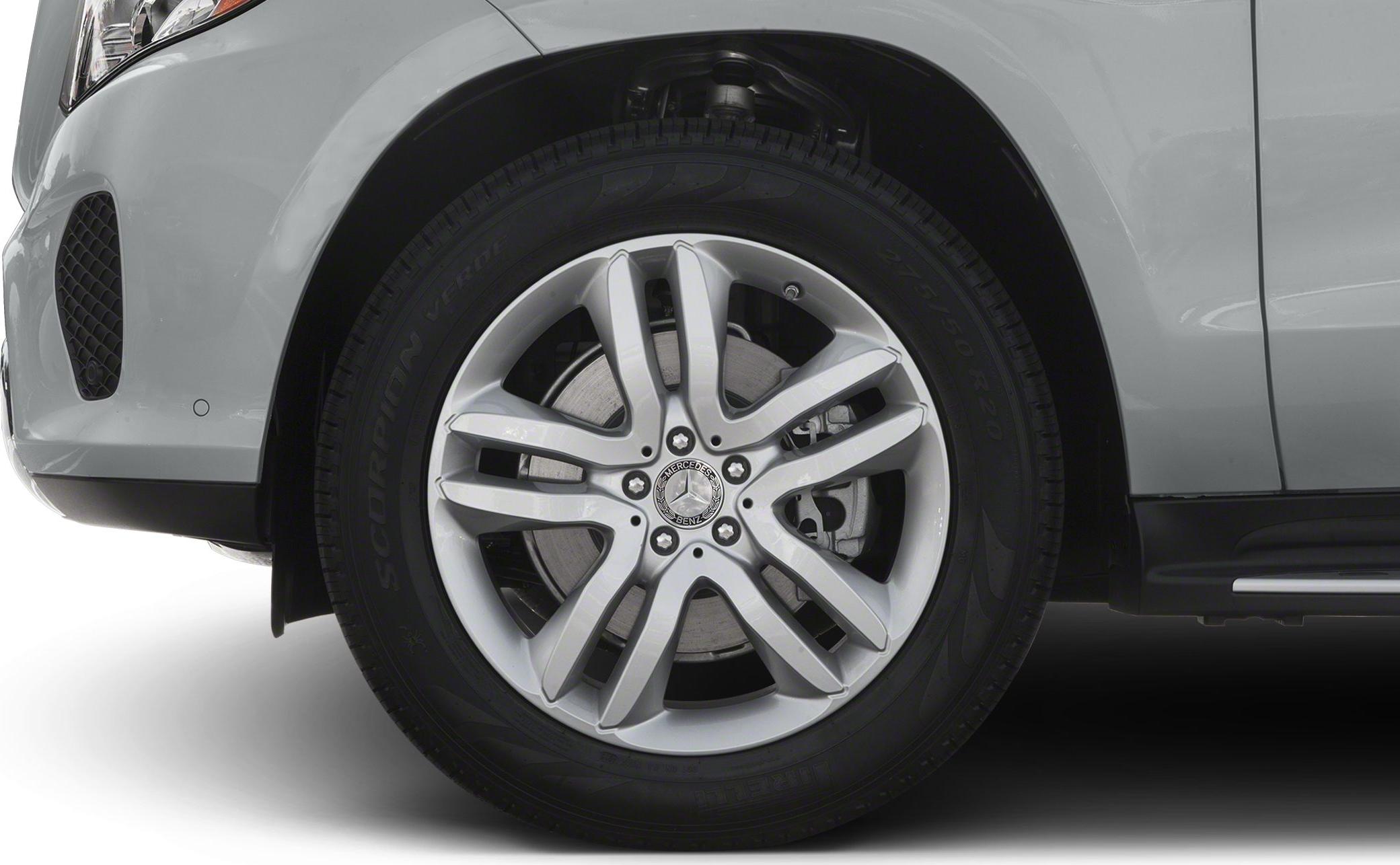 Close-up of front wheel with alloy rim and brake disc