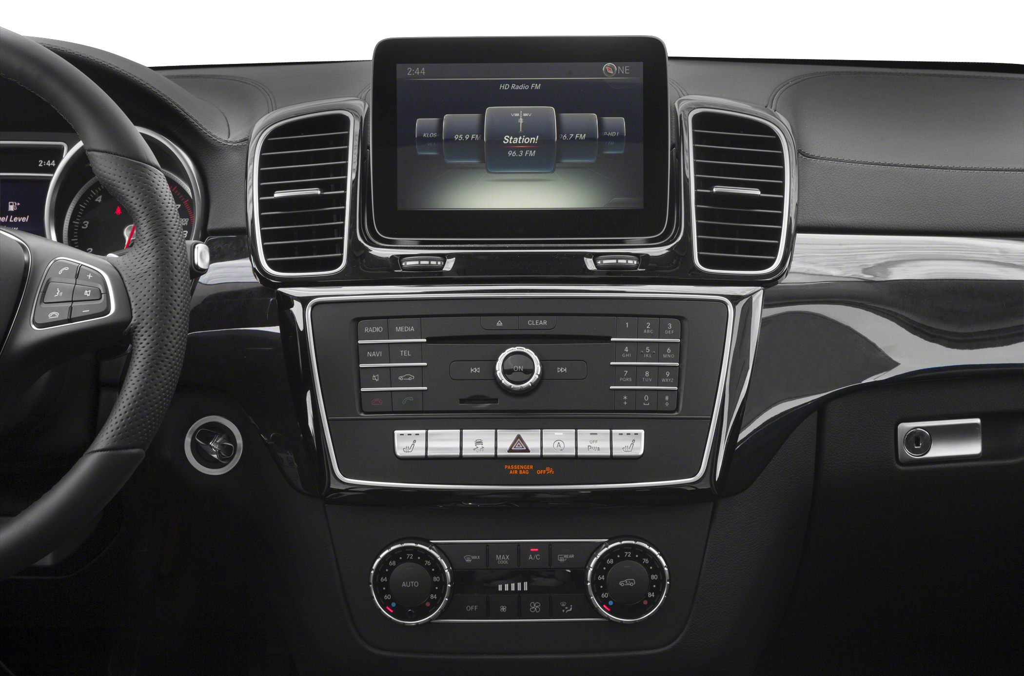 Luxury SUV interior with central infotainment screen and dual-zone climate controls