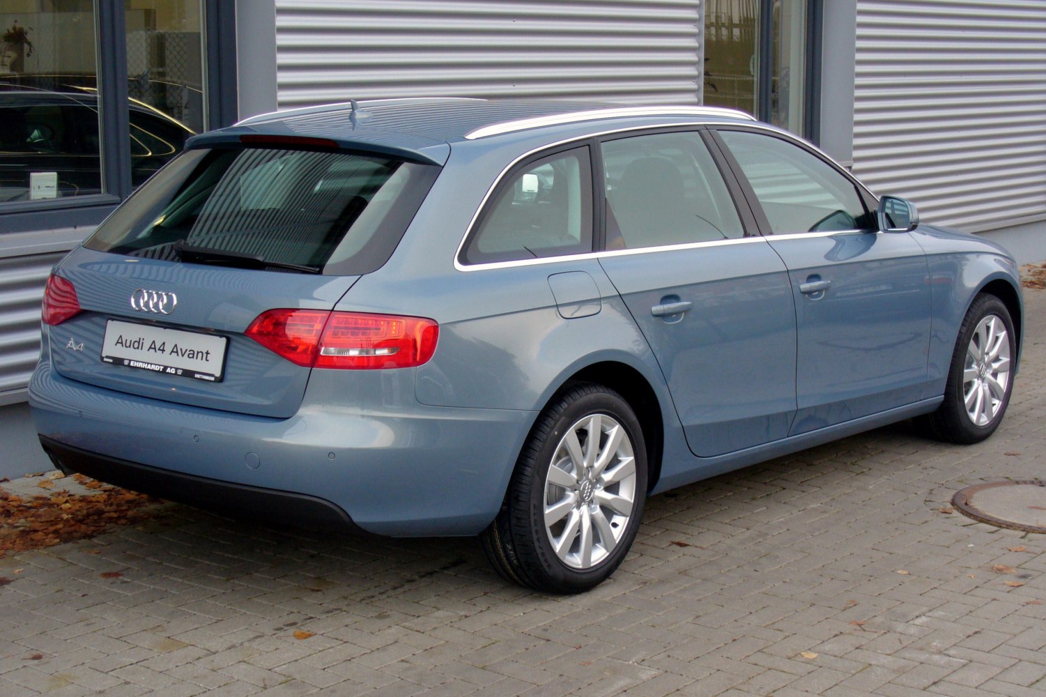 Rear-side view of a station wagon with alloy wheels and distinct rear lights