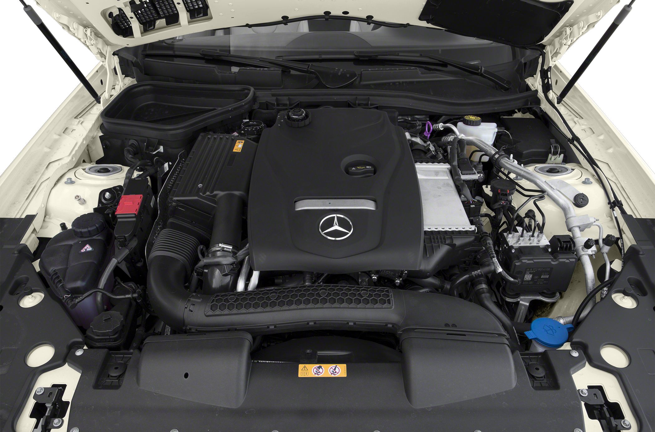Engine compartment with Mercedes-Benz emblem and detailed engine cover