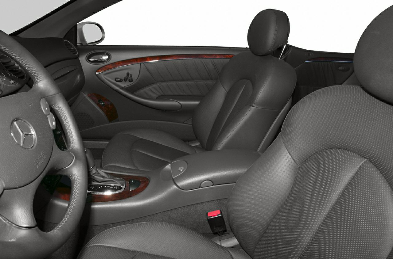Luxury leather seats with wood trim and automatic gear shift
