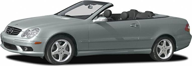 Silver convertible car with soft top and alloy wheels.