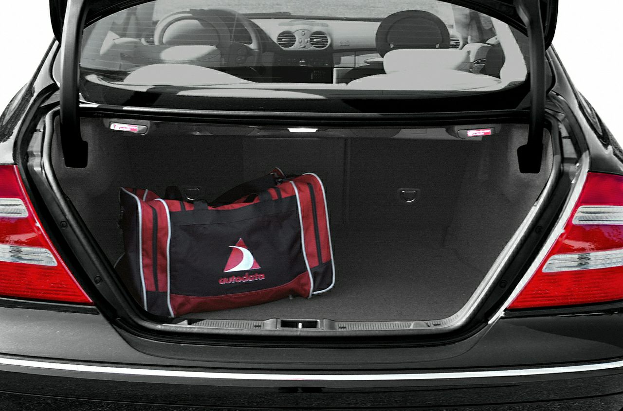 Open trunk with spacious cargo space and visible interior dashboard