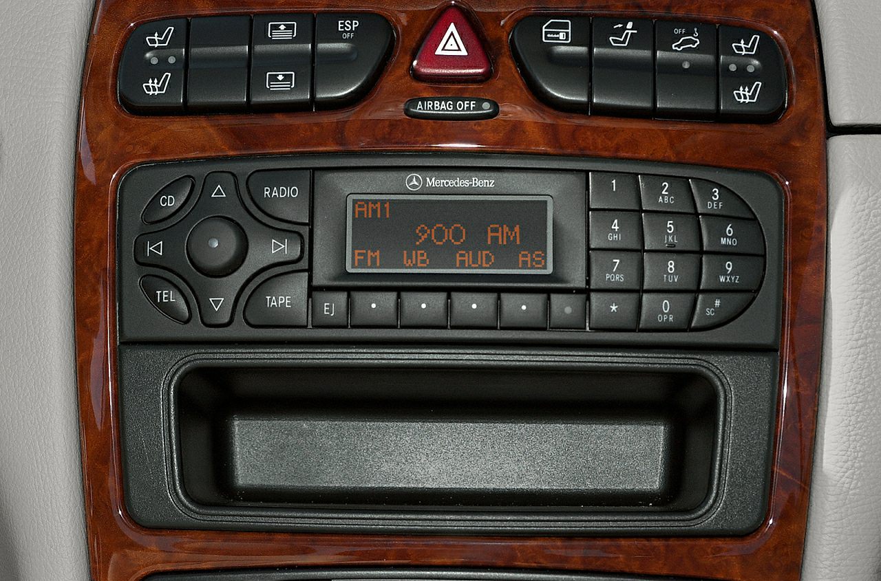 Dashboard radio and heated seat controls with wood trim