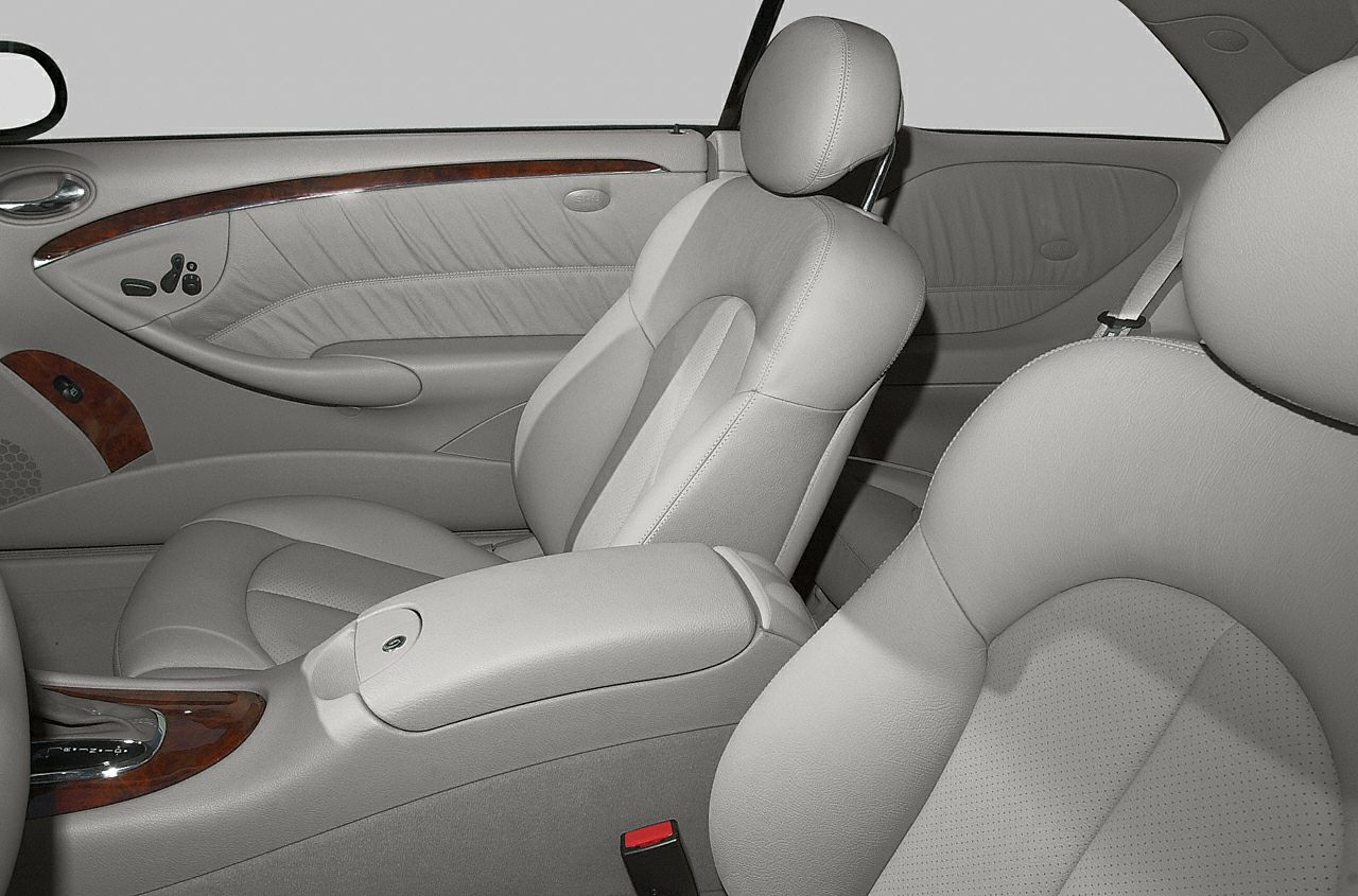 Leather car seats and wood trim interior detailing