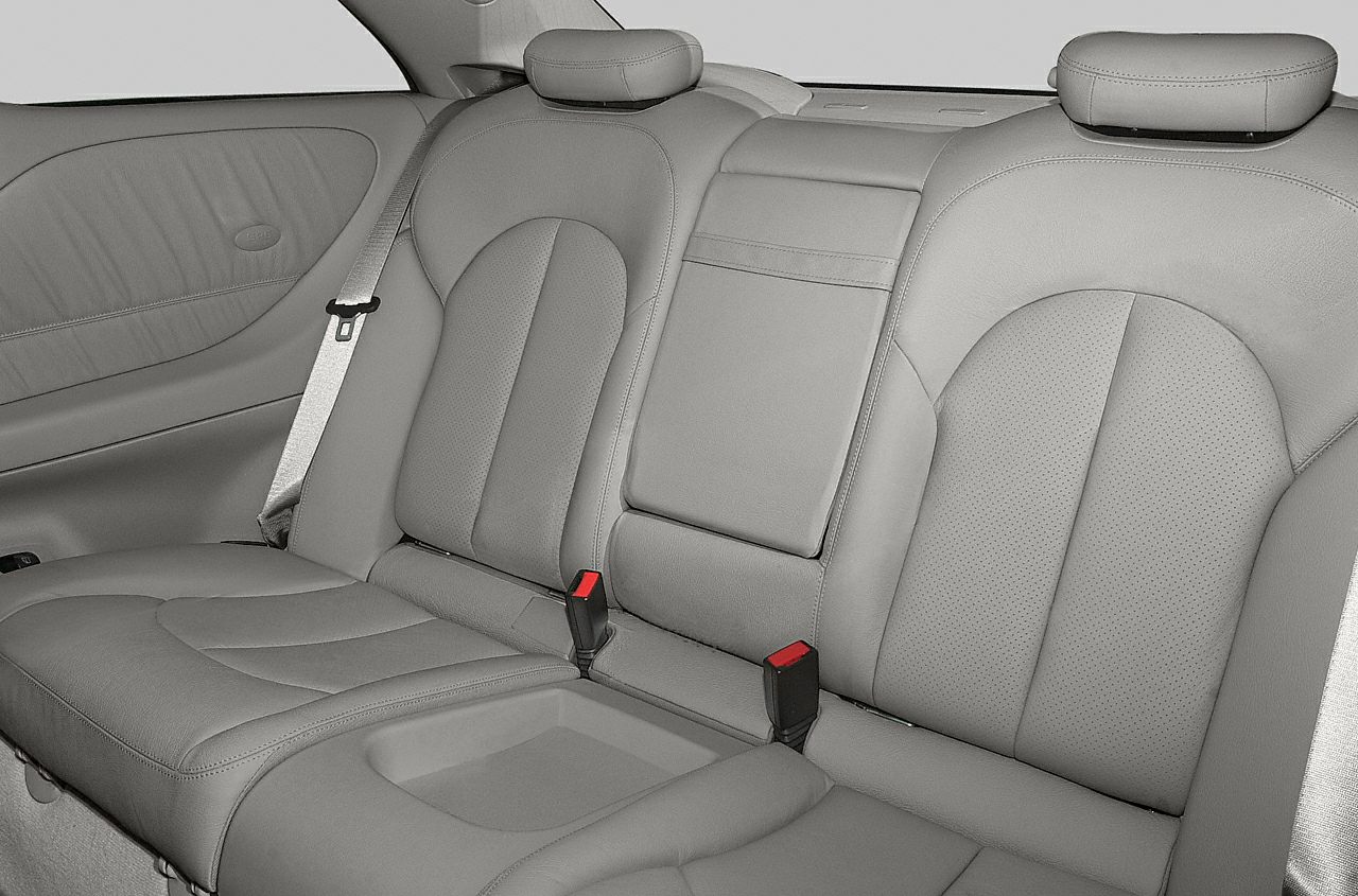 Rear leather seats with integrated headrests and seat belts
