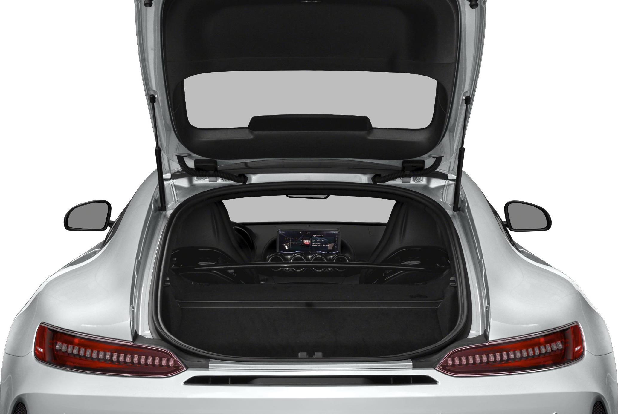 Open trunk and rear view with visible taillights and interior dashboard.