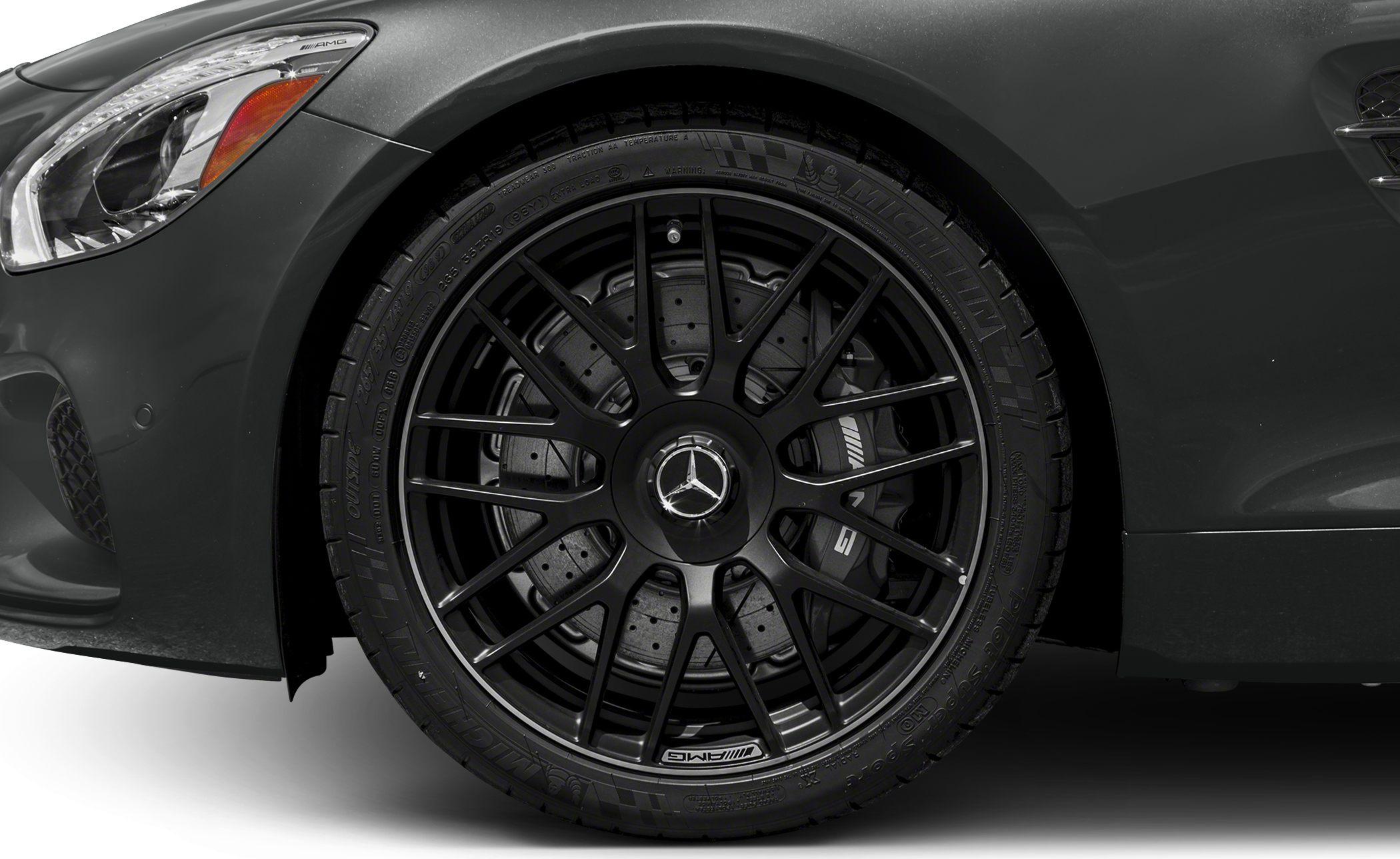 AMG multi-spoke black alloy wheel with AMG brake caliper and perforated brake disc
