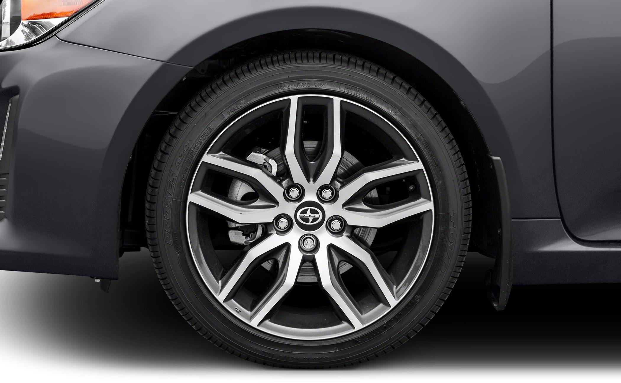 Close-up of alloy wheel with brake disc and caliper