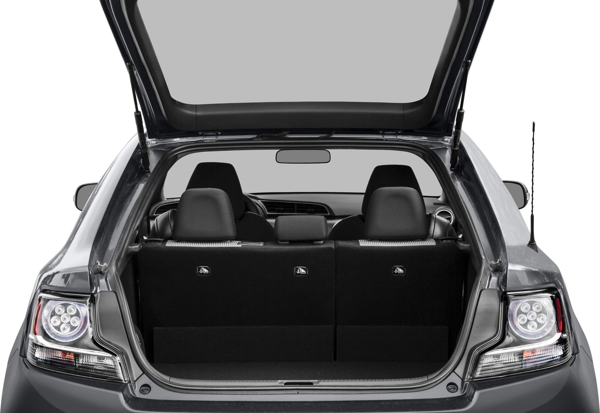 Open hatchback trunk with rear seats and taillights visible