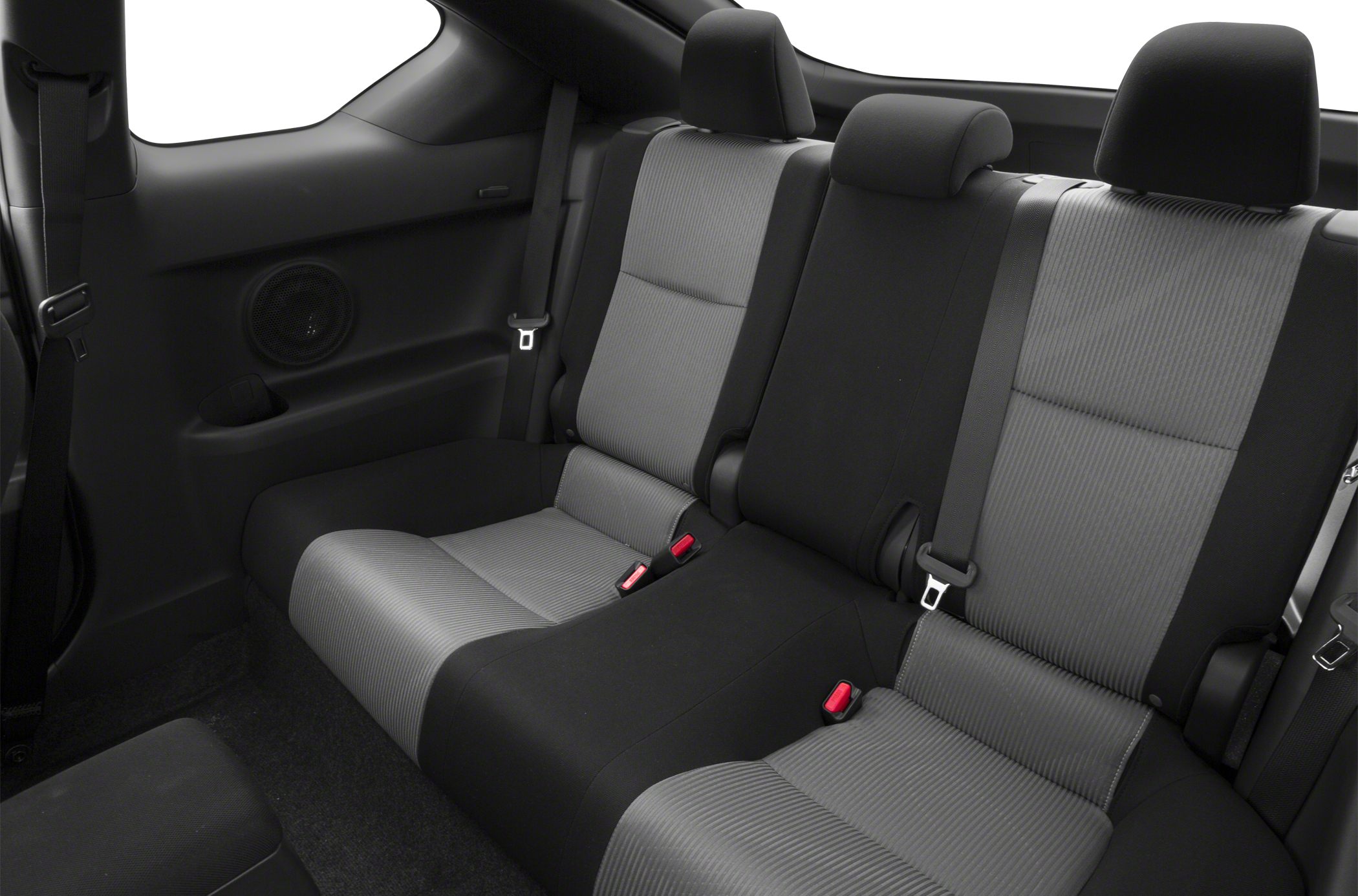 Rear seat with fabric upholstery, integrated headrests, and seat belts