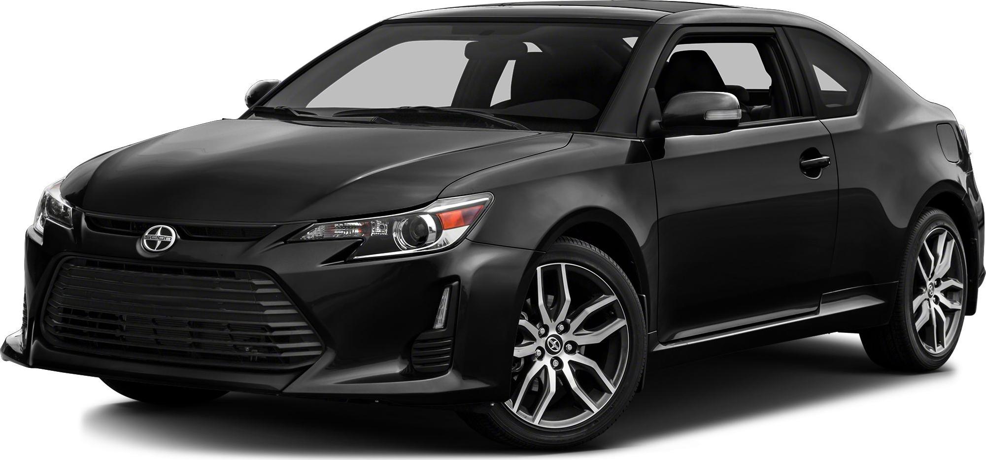 Black hatchback with wide front grille and alloy wheels
