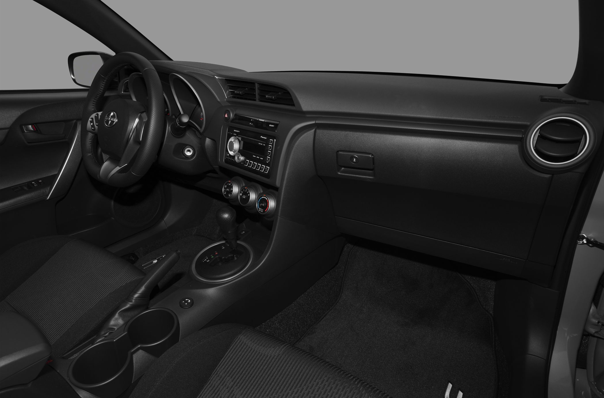 Interior dashboard, steering wheel, center console with gear shift