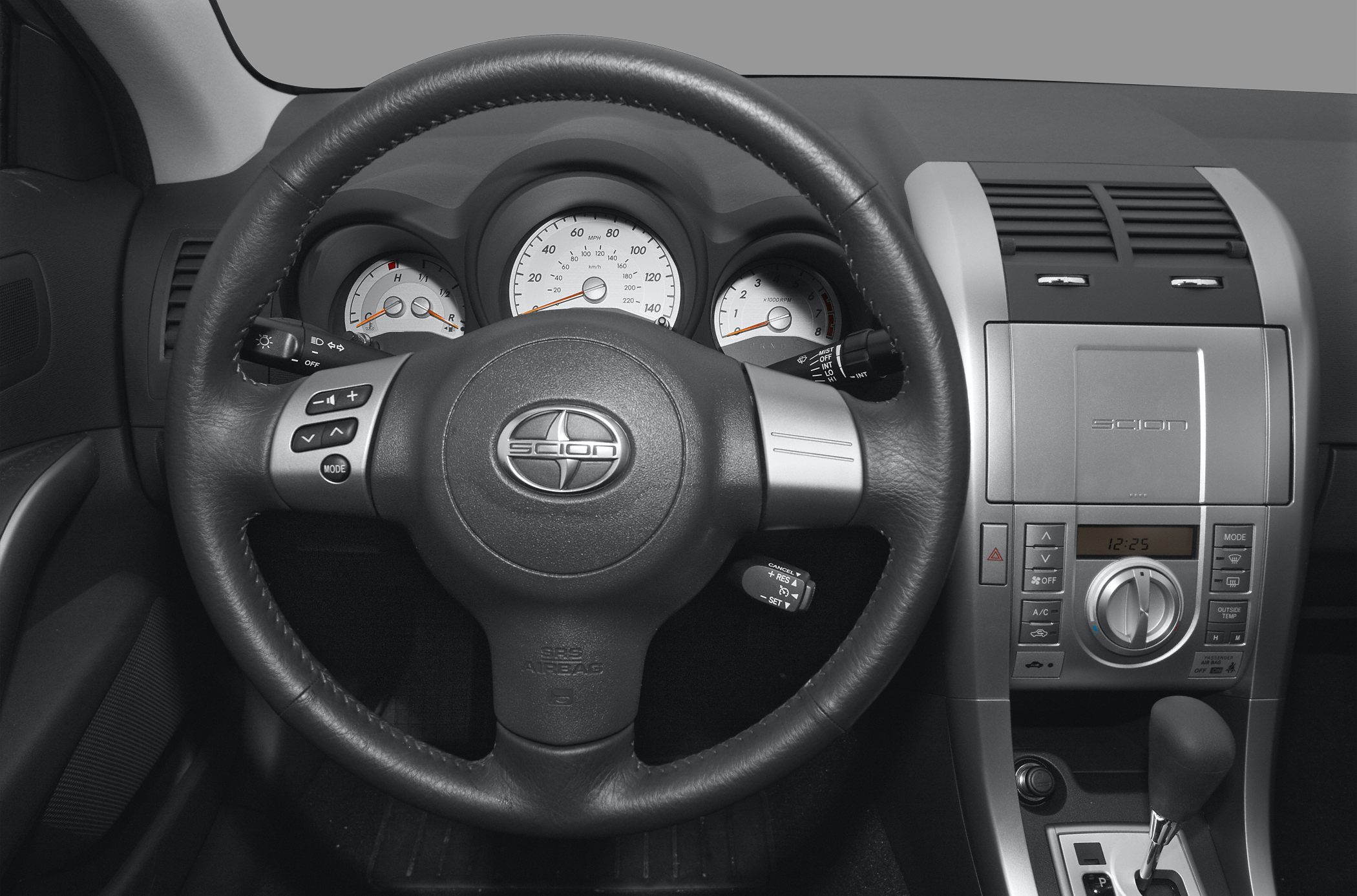 Steering wheel, instrument cluster, center console controls