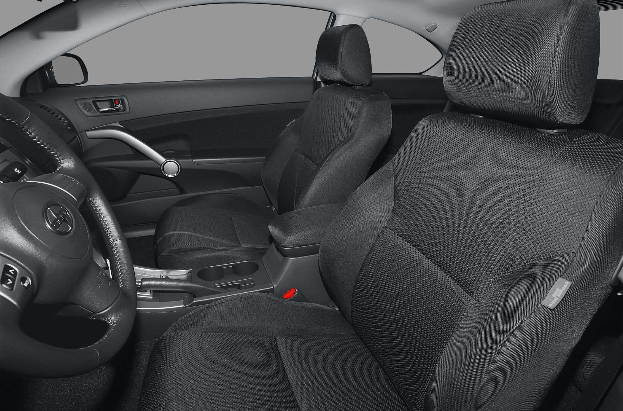 Fabric upholstered front seats with dashboard and center console