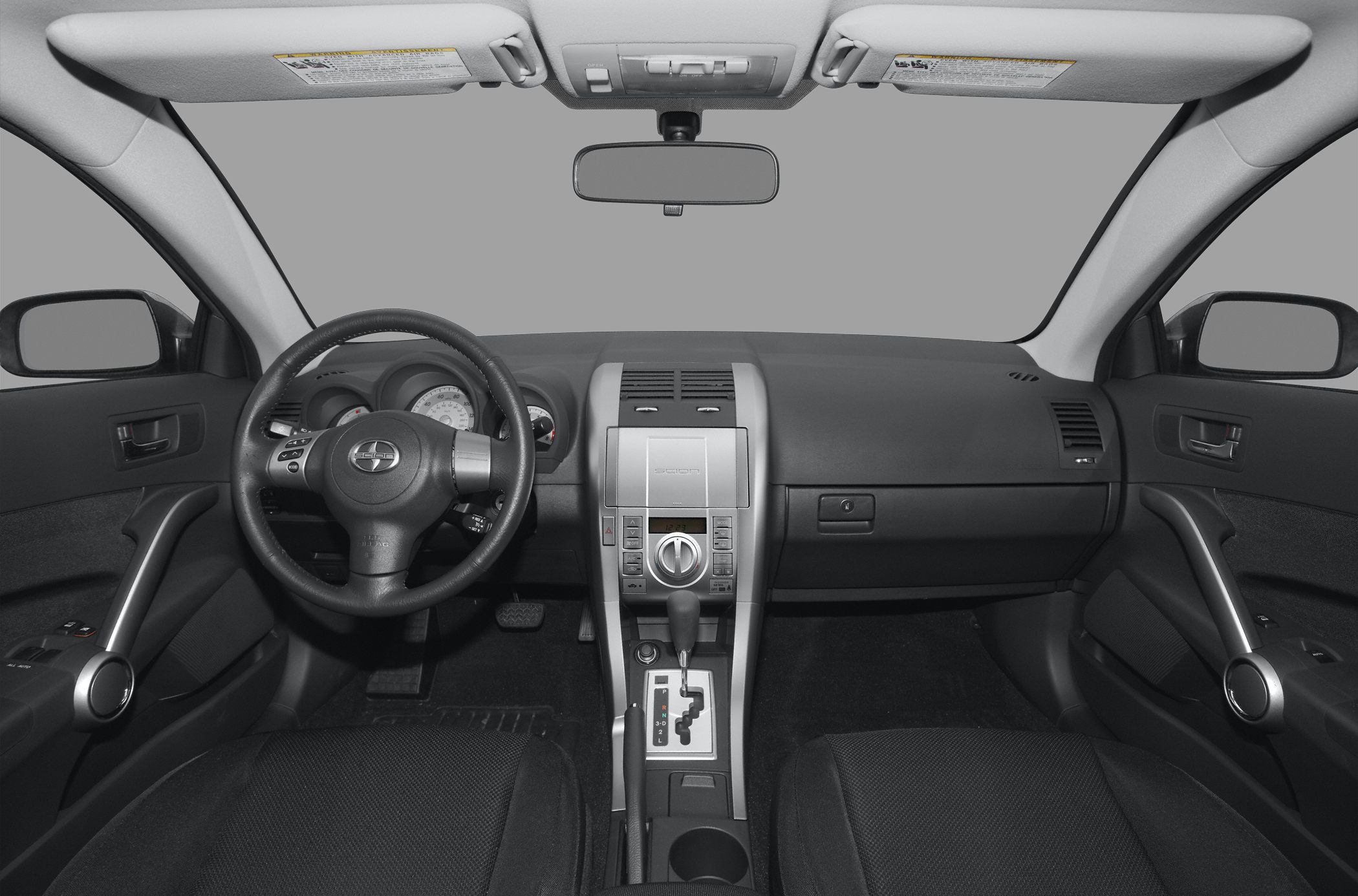 Dashboard, steering wheel, and center console interior features