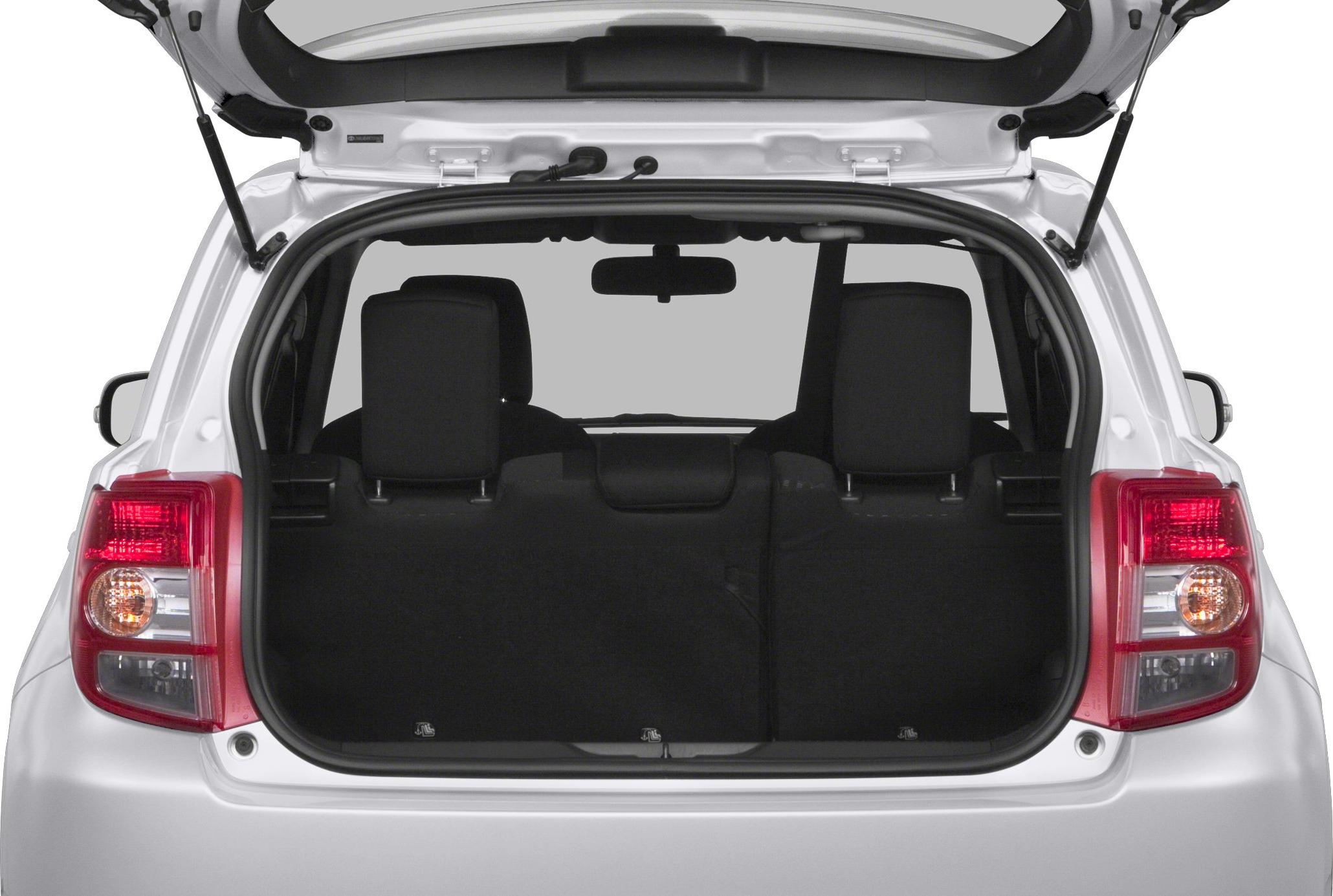 Open rear hatch with visible cargo area and rear seats