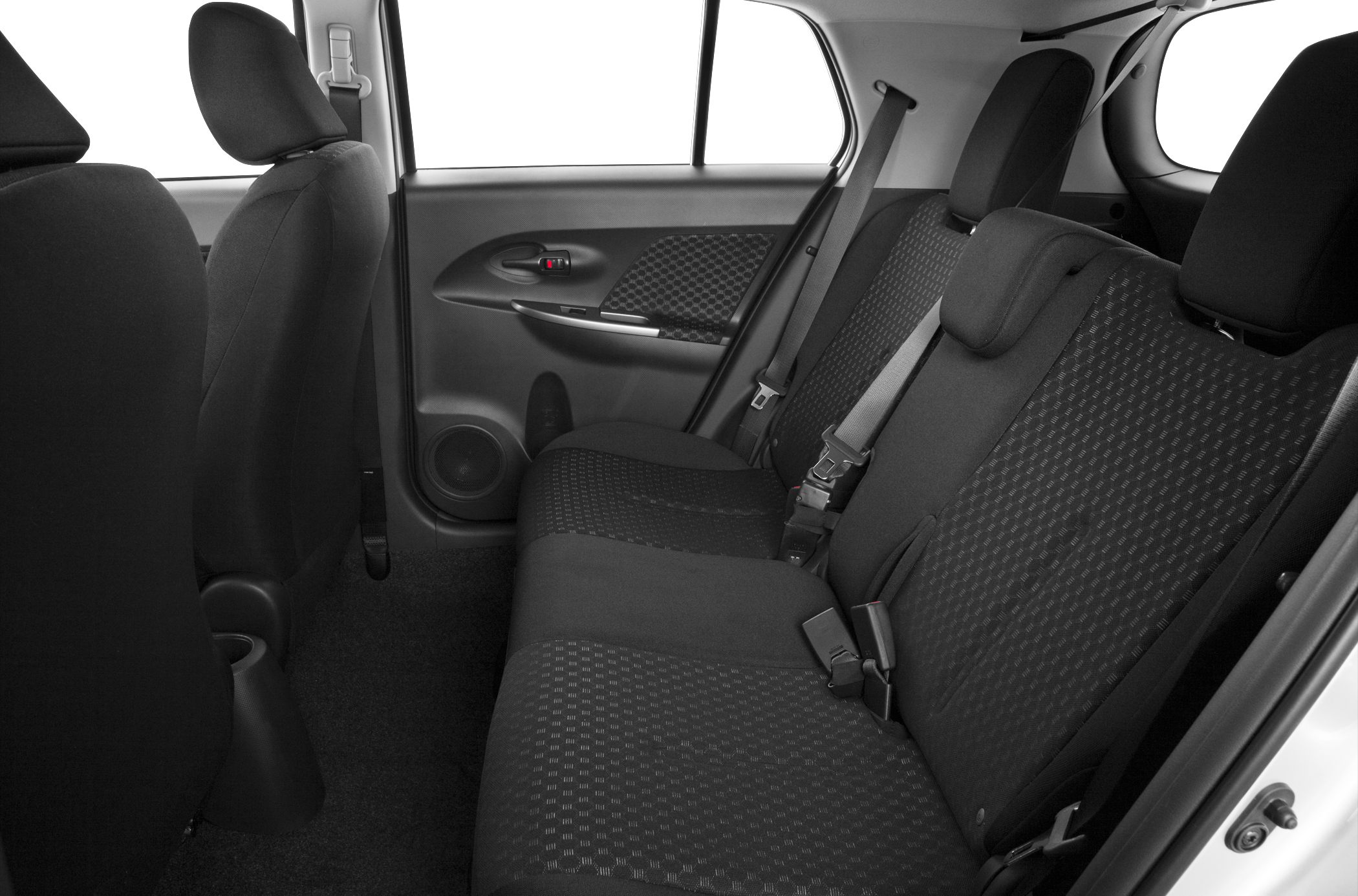 Rear seat design with fabric upholstery and seatbelts