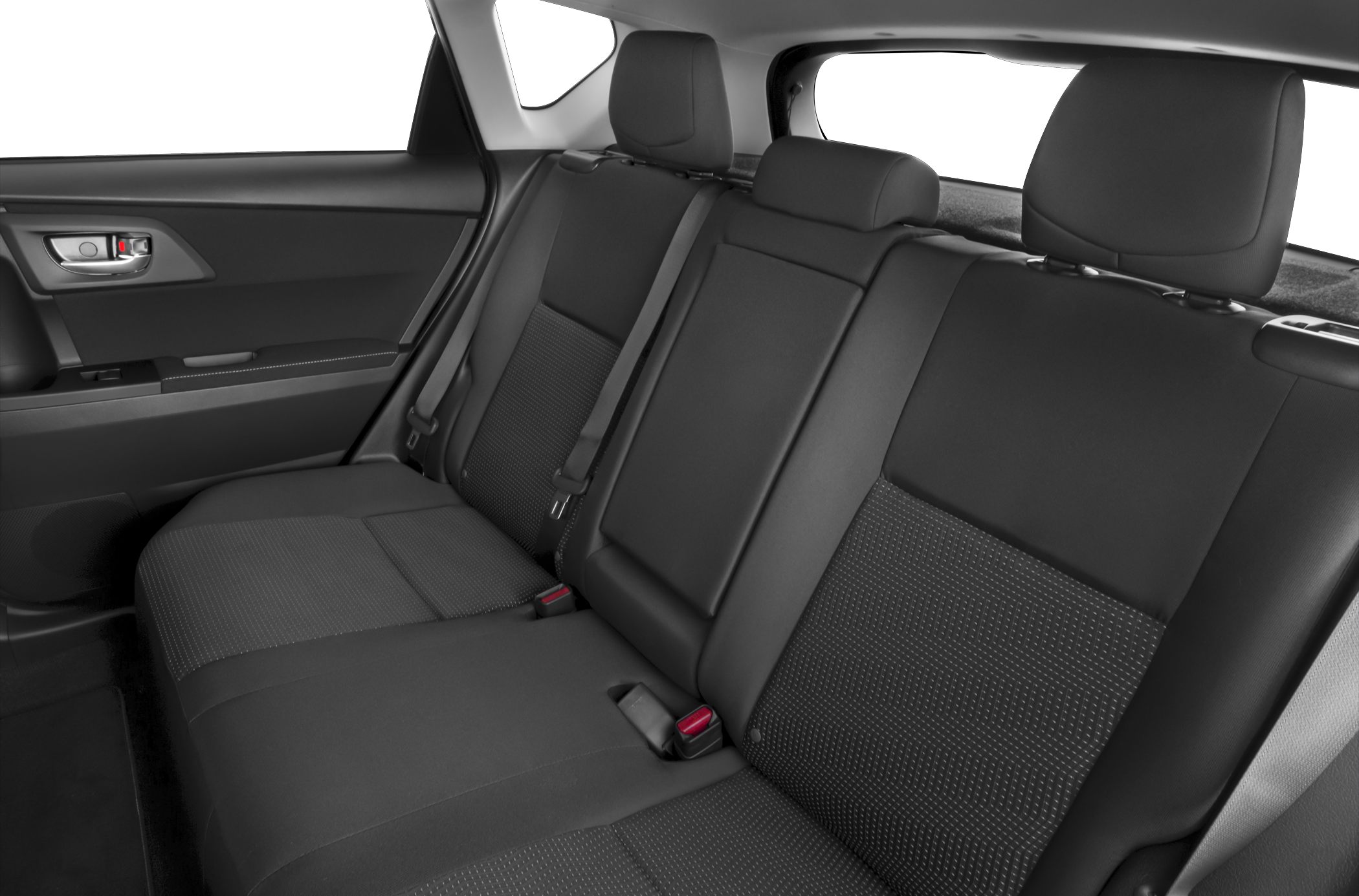 Rear seat interior with black upholstery, seat belts, and headrests