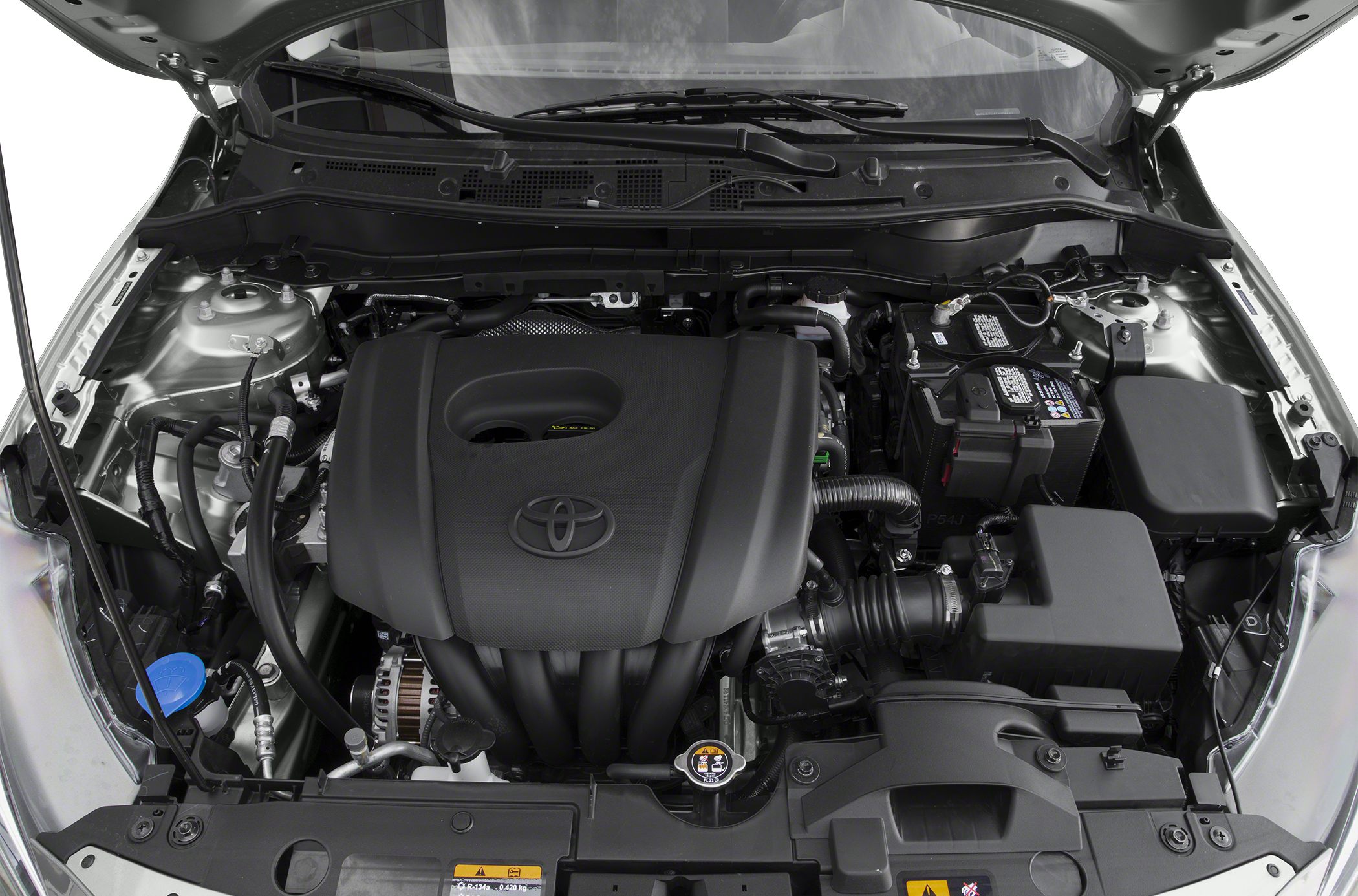 Engine bay with Toyota-branded engine cover and visible components