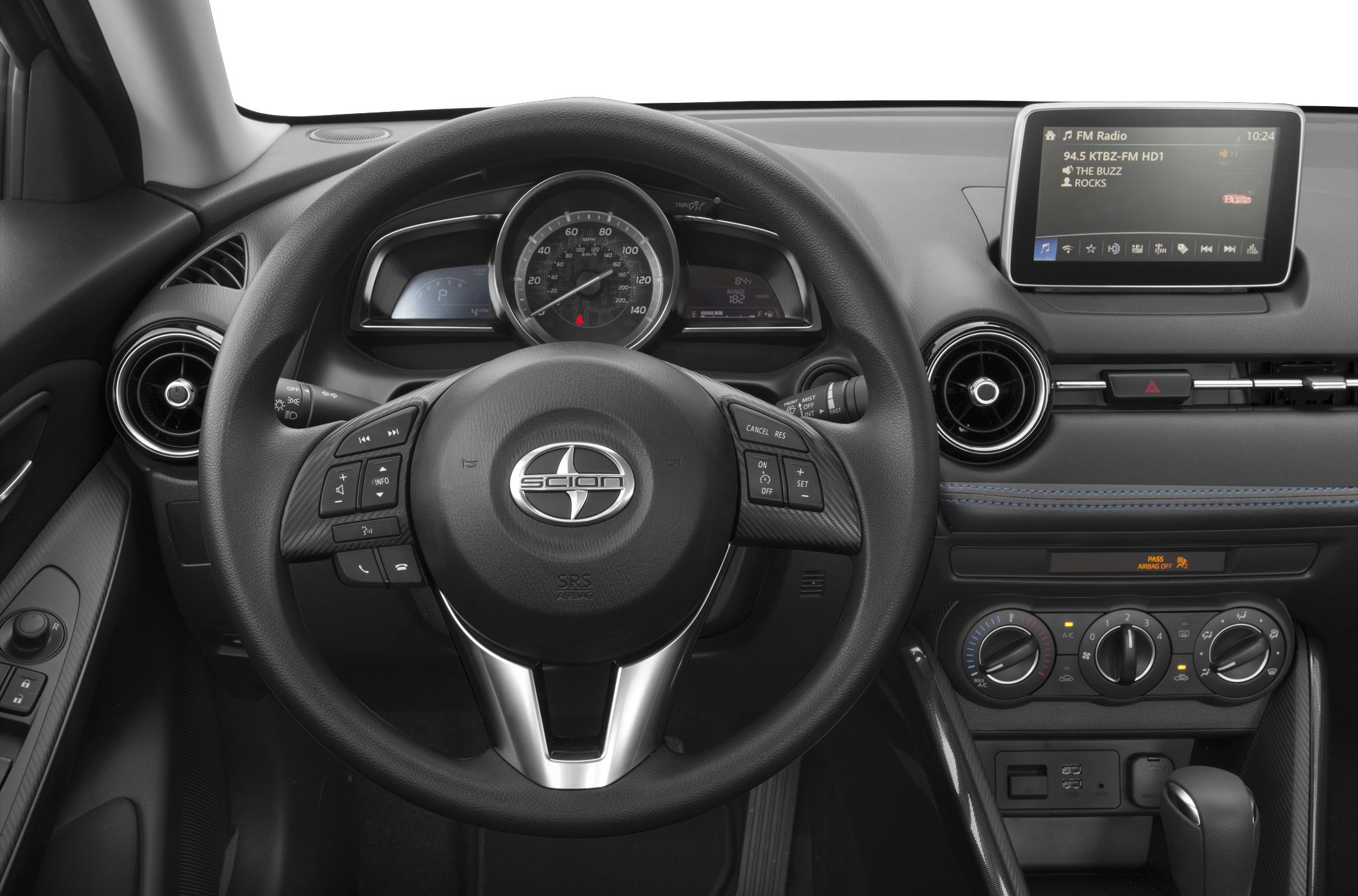 Dashboard with steering wheel controls and multimedia display