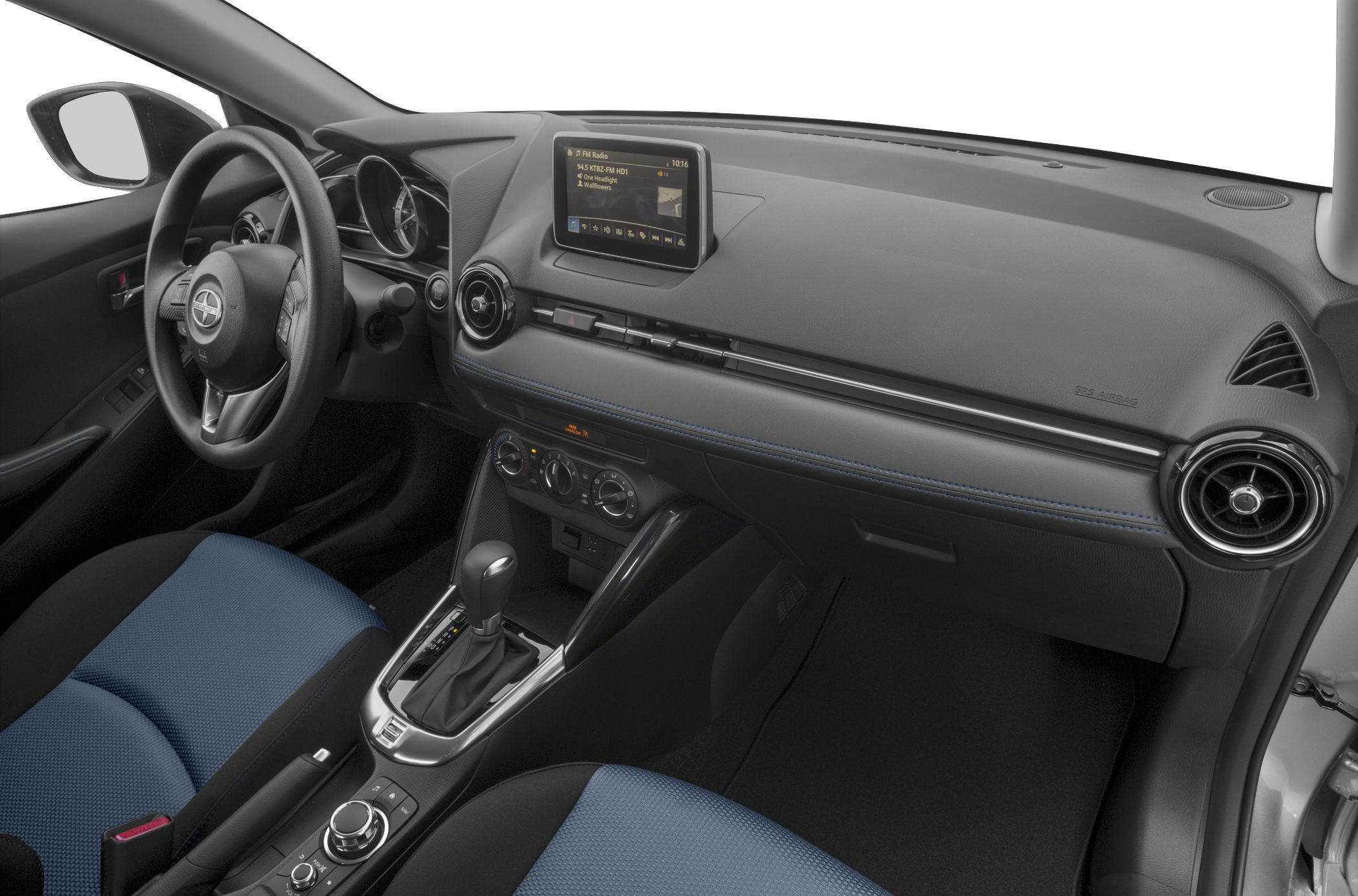 Modern dashboard with infotainment screen and gear shifter