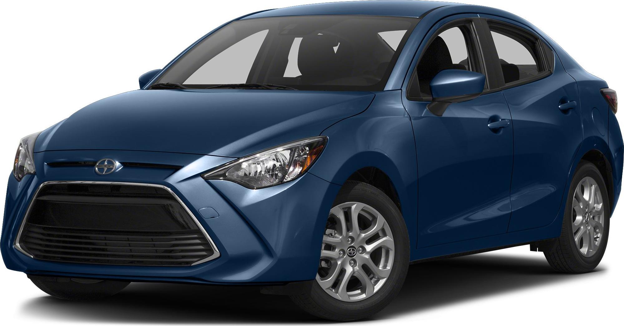 Distinctive front grille and sharp headlights of a blue compact hatchback