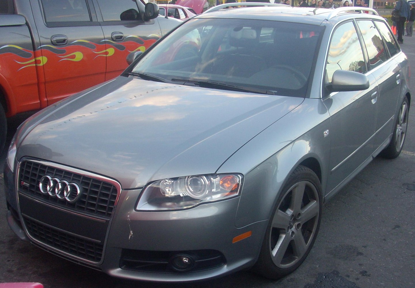 Front and side view with distinctive headlights and alloy wheels